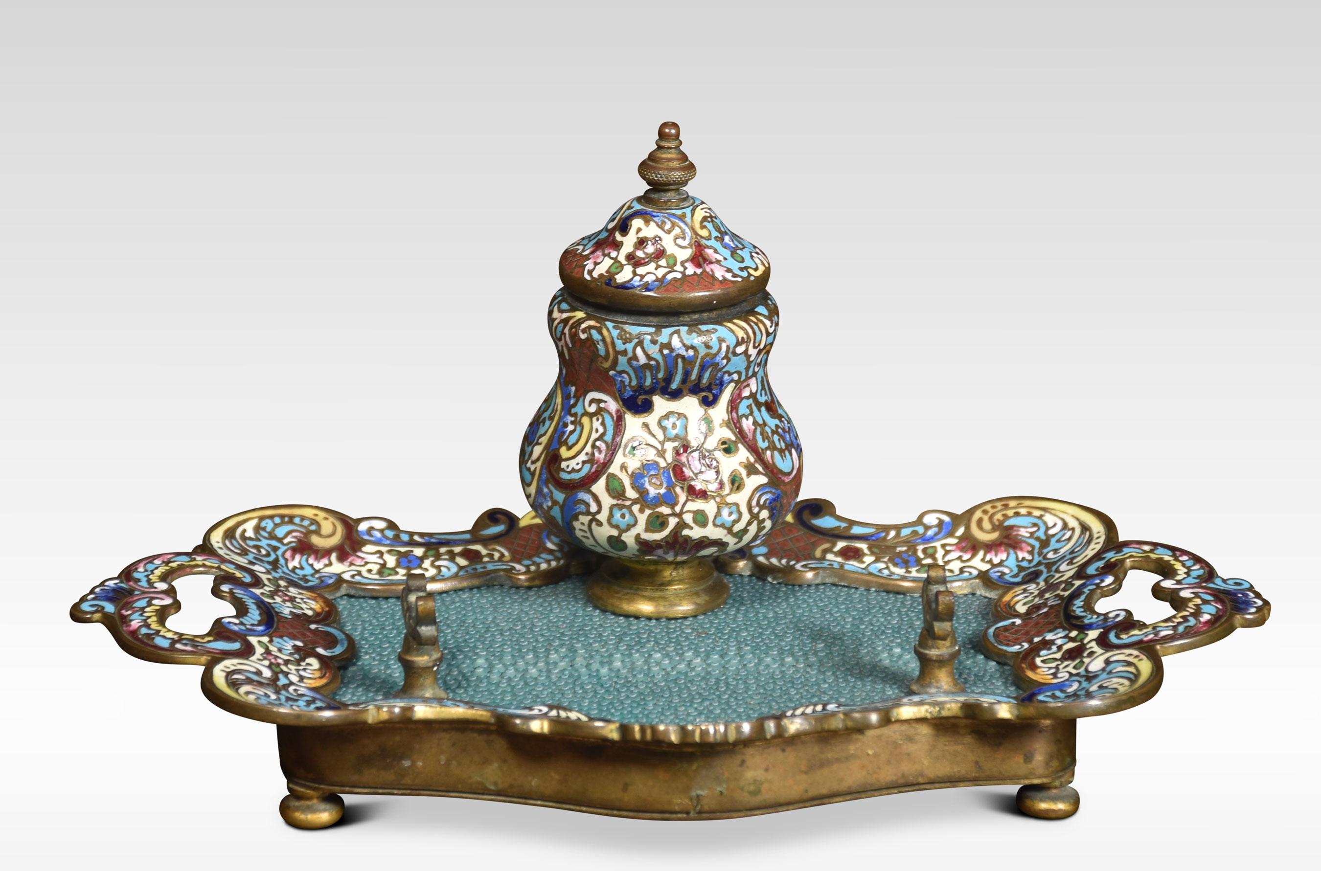 19th Century gilt bronze and champlevé enameled inkstand with single well with hinge cover and pen rest. All raised up on bun feet.
Dimensions
Height 4.5 inches
Width 8.5 inches
Depth 5.5 inches.