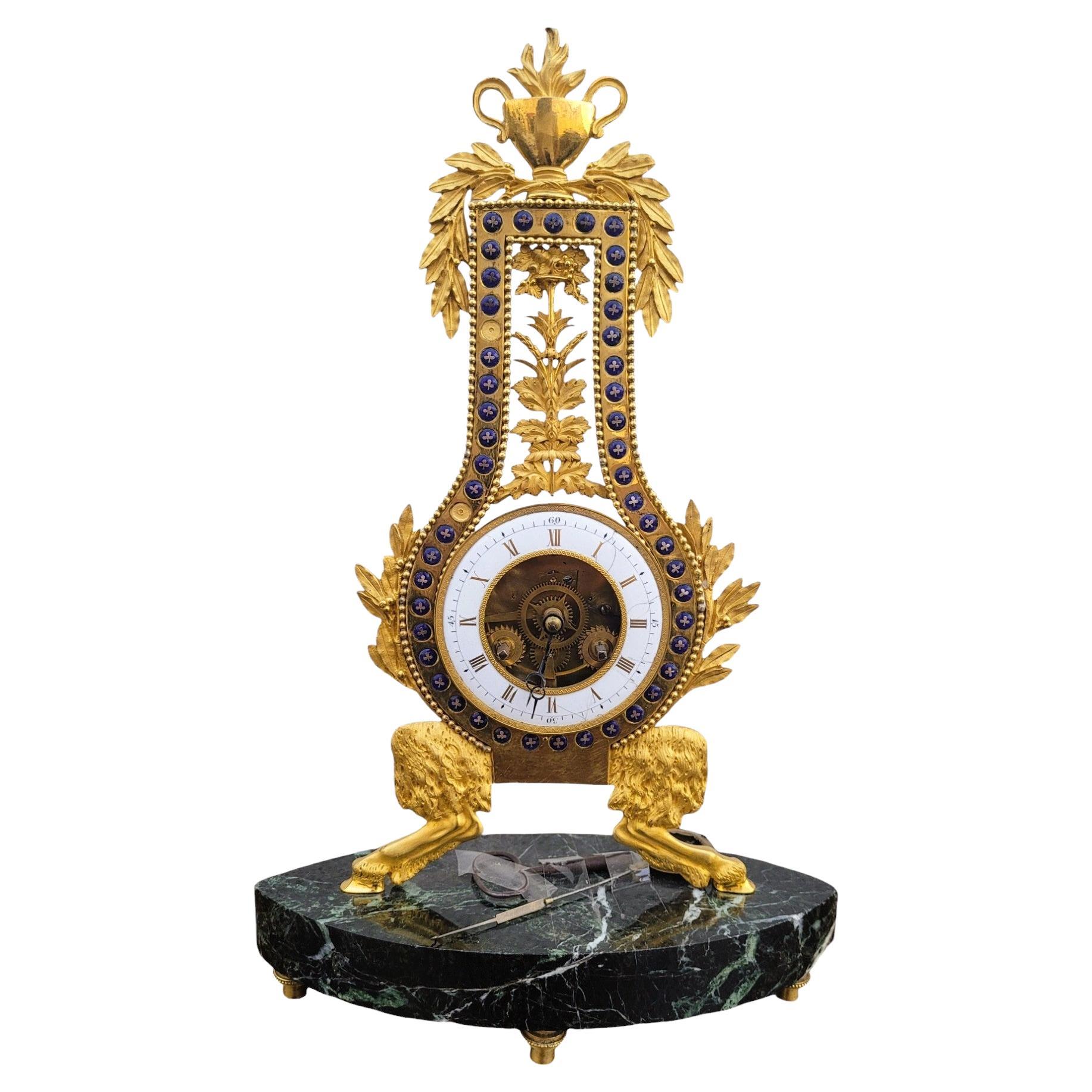 Orologio in bronzo dorato e smaltato, periodo 18° secolo