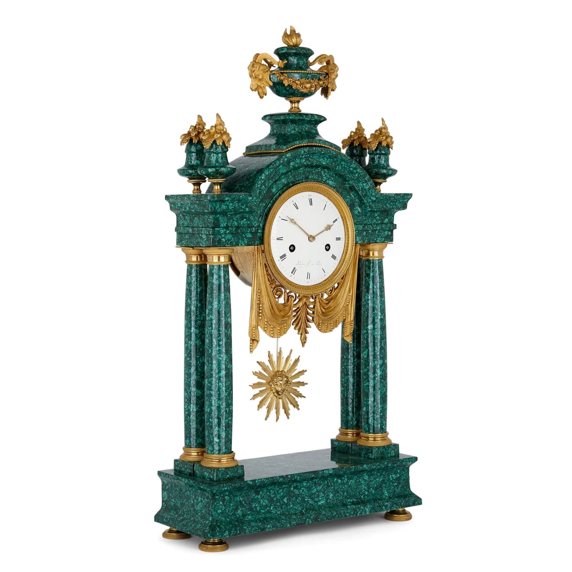 Gilt bronze and malachite Louis XVI clock
French, late 18th century
Measures: Height 69cm, width 36cm, depth 13.5cm

This fine Louis XVI mantel clock is wrought from malachite and gilt bronze. The malachite veneer is a later, beneficial