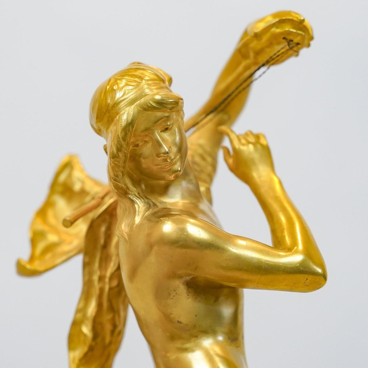 Escultura de bronce dorado y ónice de Henri Peinte, 1900. 4