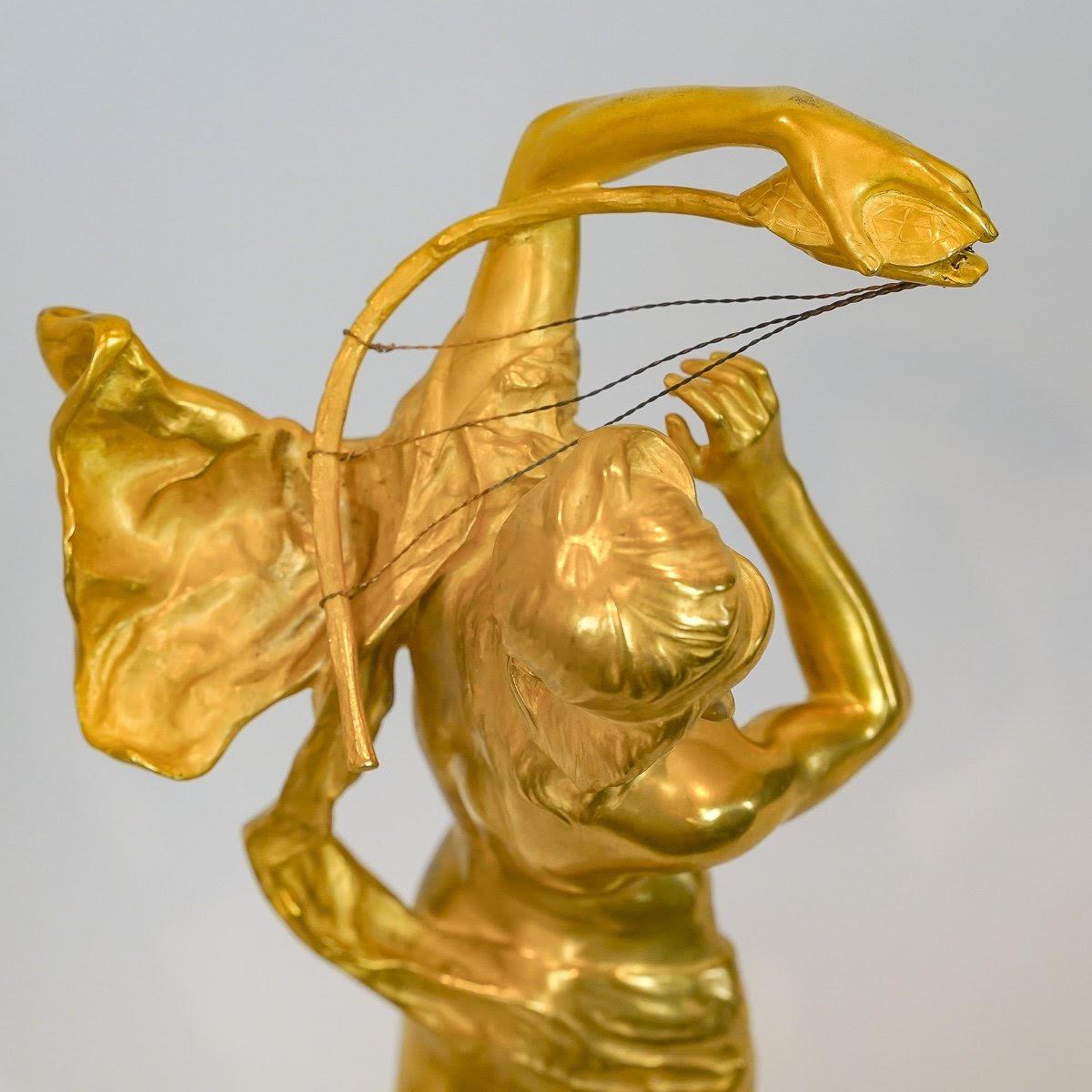 Escultura de bronce dorado y ónice de Henri Peinte, 1900. 1
