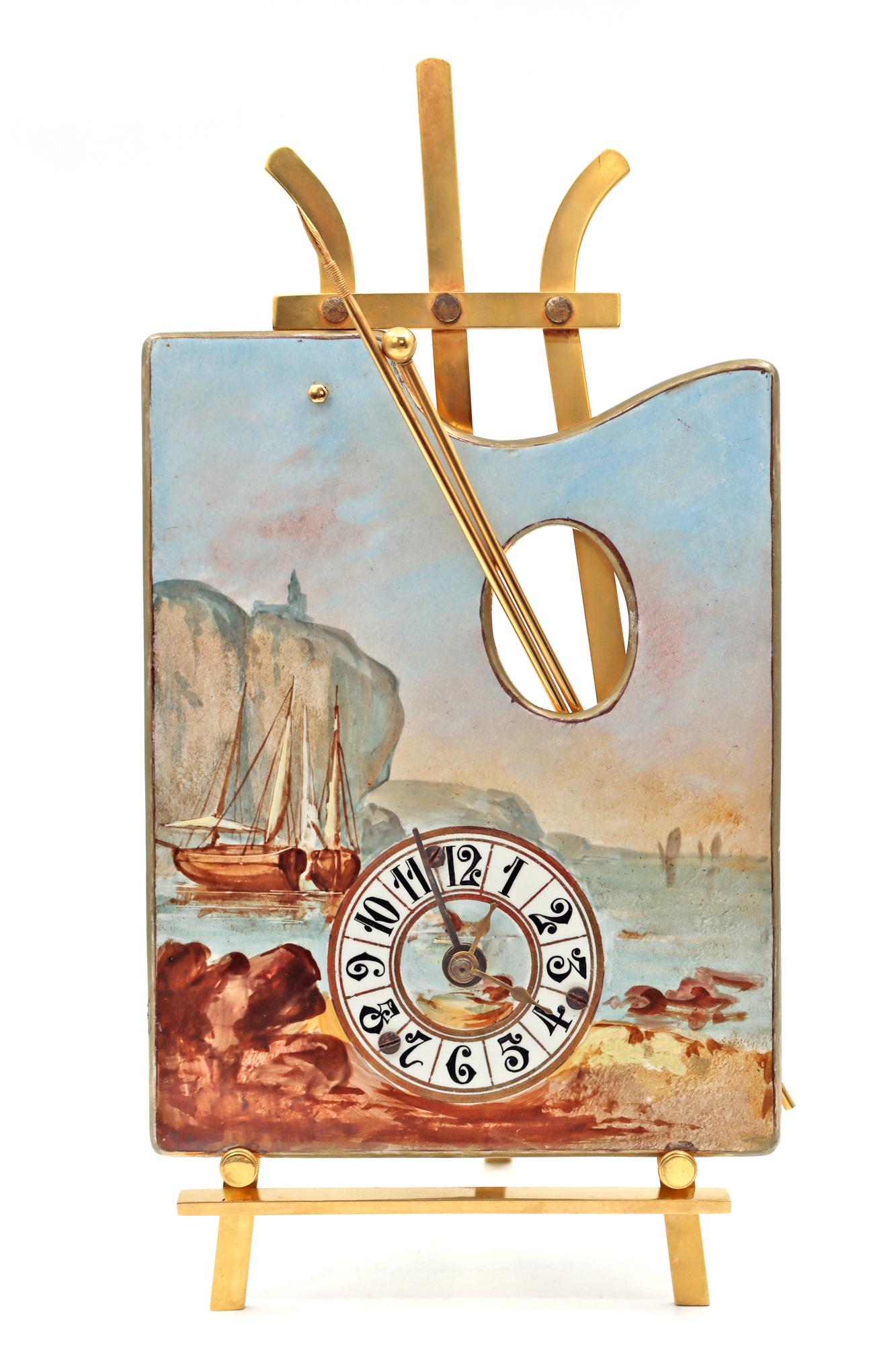 Gilt bronze and painted porcelain clock in the form of an easel, early 19th century.
