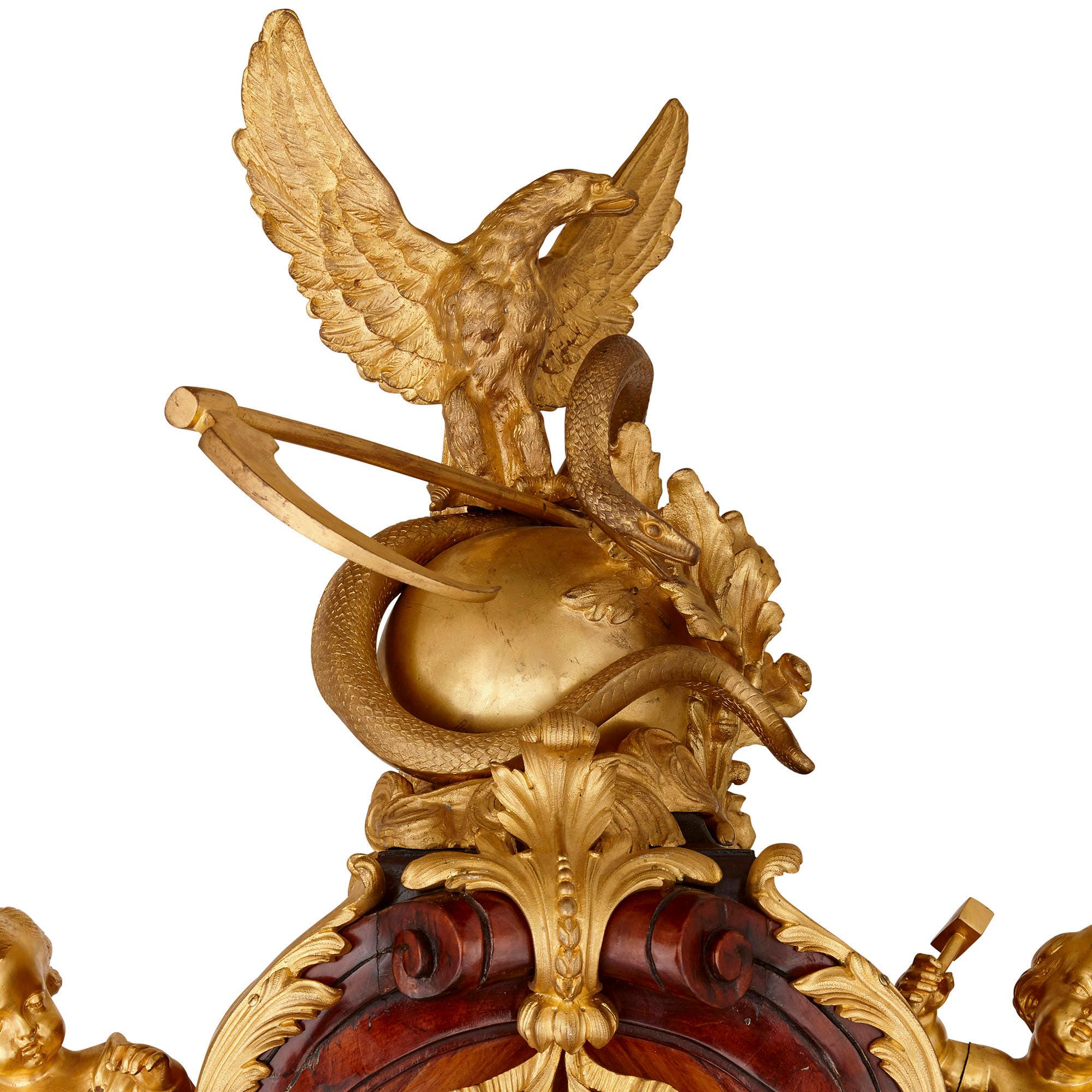 Standuhr aus vergoldeter Bronze und Parkett von Kahn im Régence-Stil (Goldbronze) im Angebot