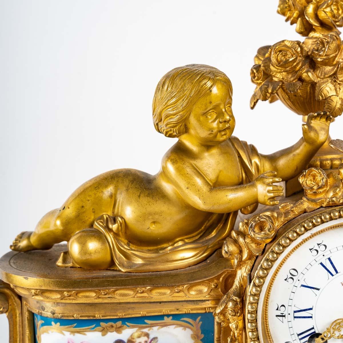 Napoleon III Gilt bronze and porcelain clock, 19th century