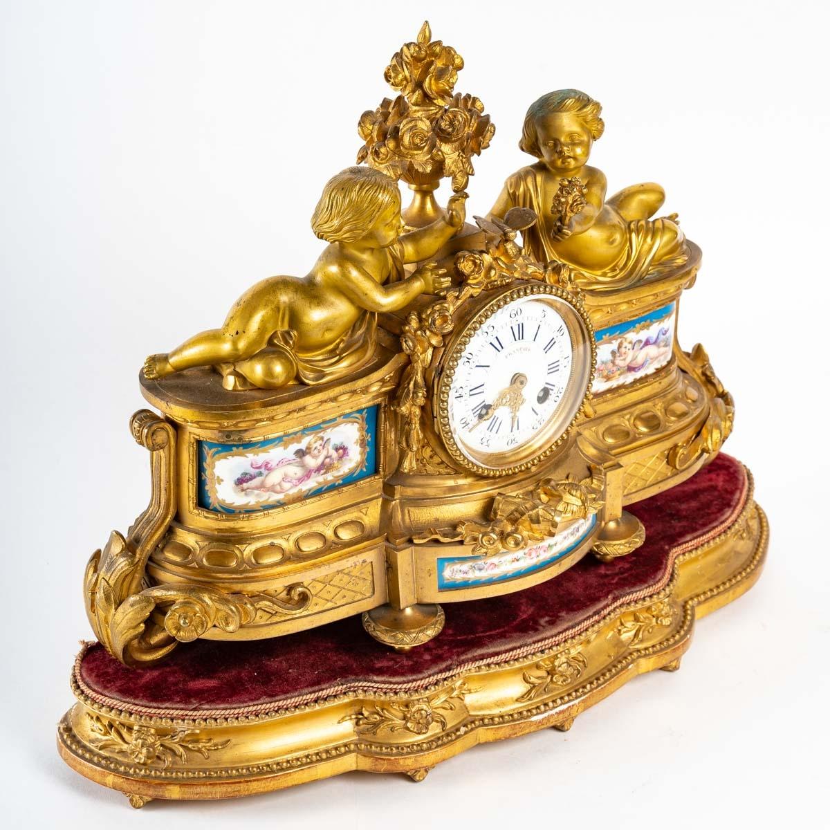 European Gilt bronze and porcelain clock, 19th century