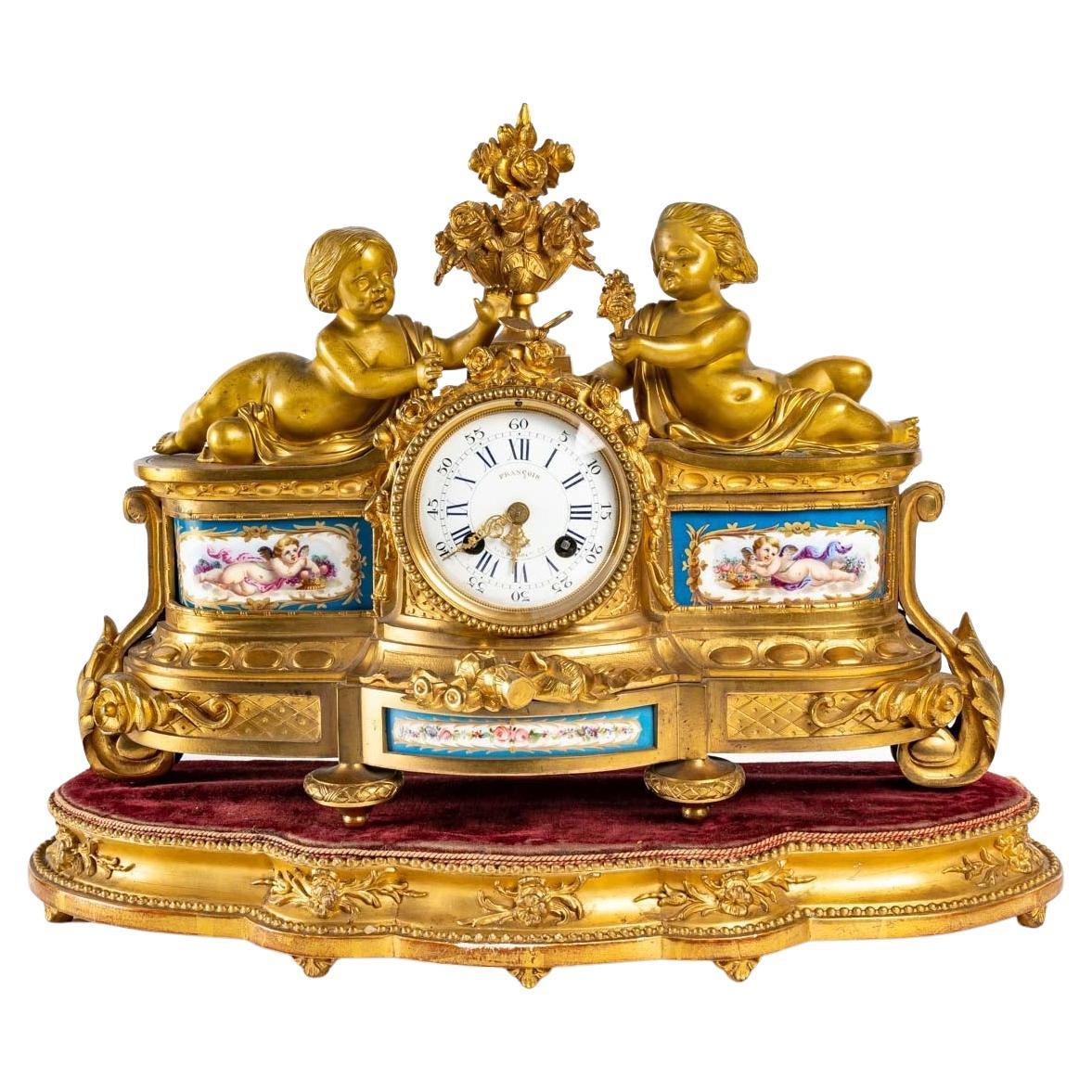 Gilt bronze and porcelain clock, 19th century