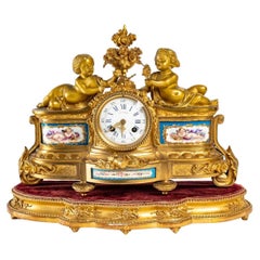 Gilt bronze and porcelain clock, 19th century