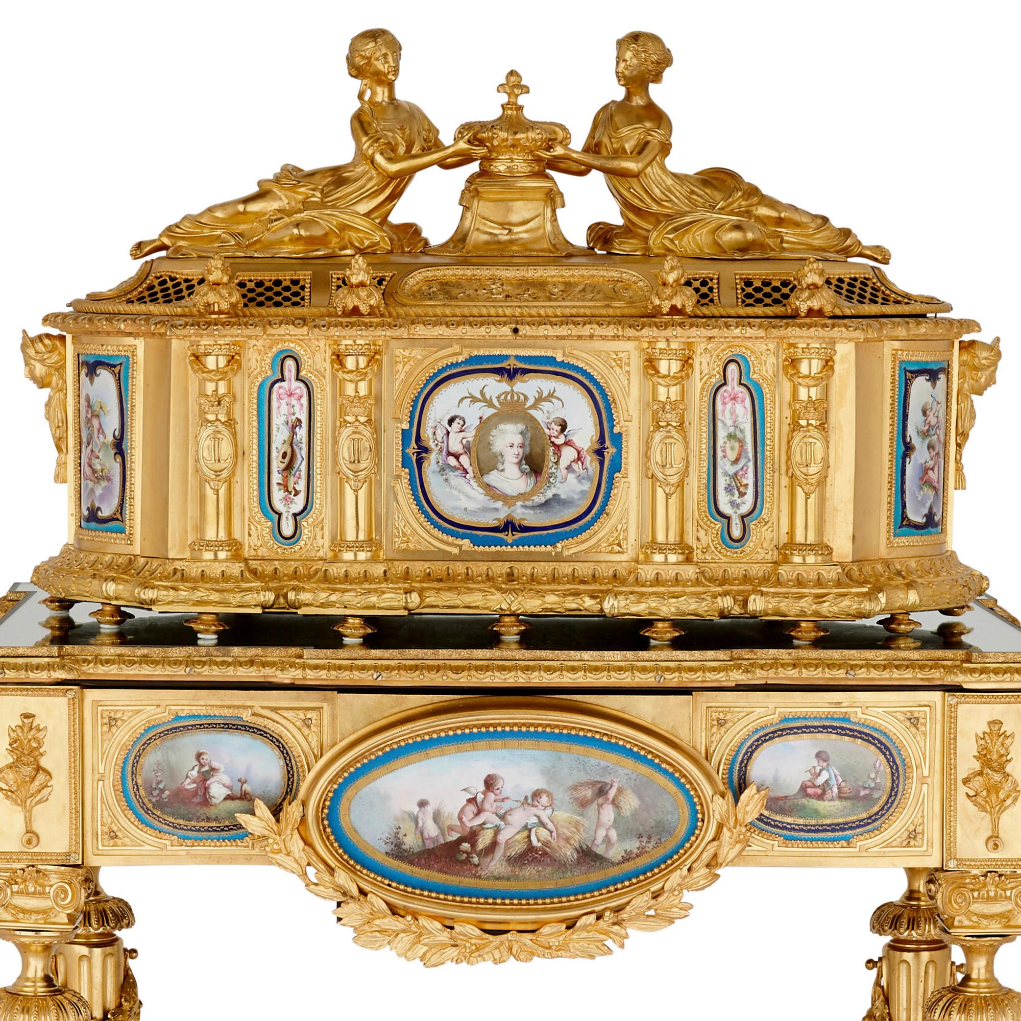 Gilt bronze and Sèvres style porcelain Louis XVI style casket on stand

This magnificent Louis XVI style ormolu casket is supported by a mirror-topped table stand, which sits on four tapered, fluted legs connected by a curving X-form stretcher. In