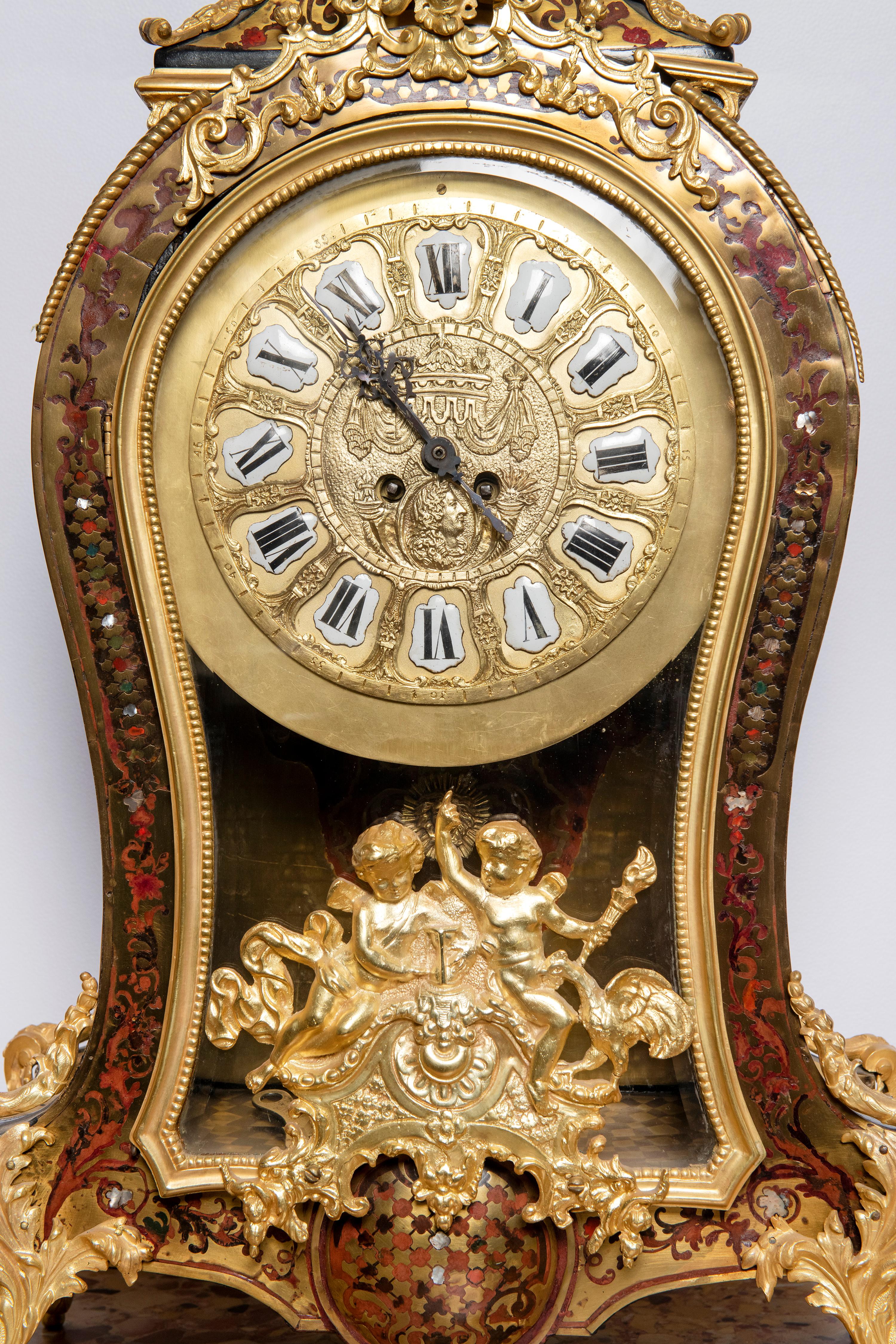 Gilt bronze and wood table clock, France, late 19th century.