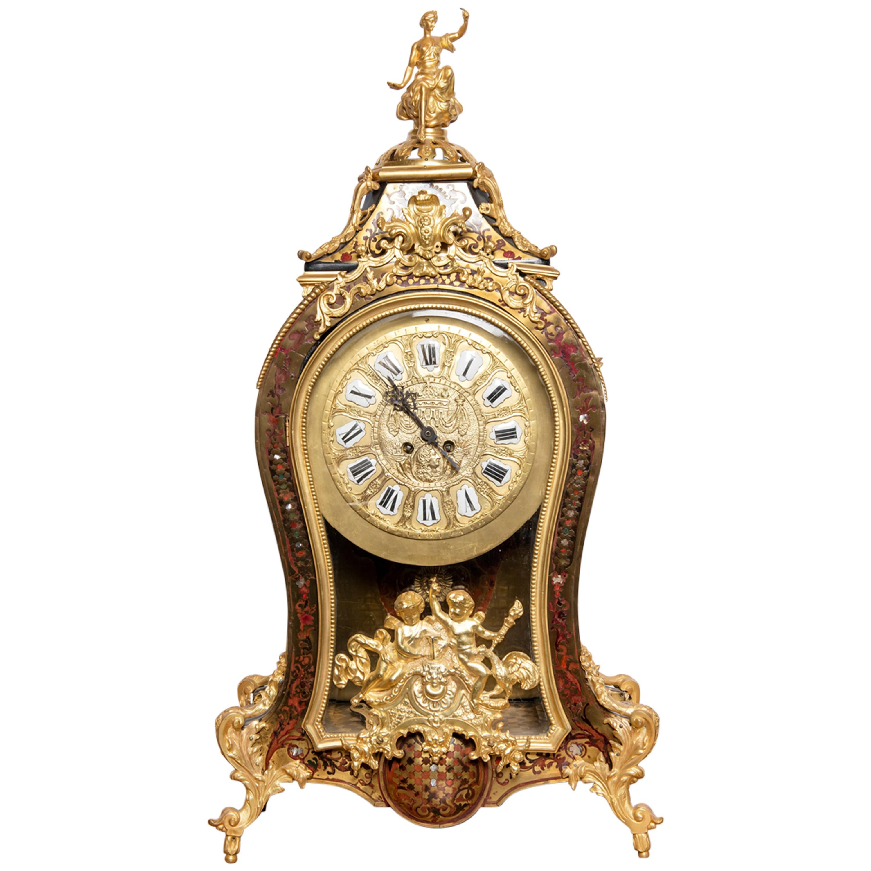 Horloge de table en bronze doré et bois:: France:: fin du 19e siècle