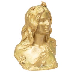 Buste d'une jeune fille en bronze doré Art Nouveau, signé Savine, vers 1895