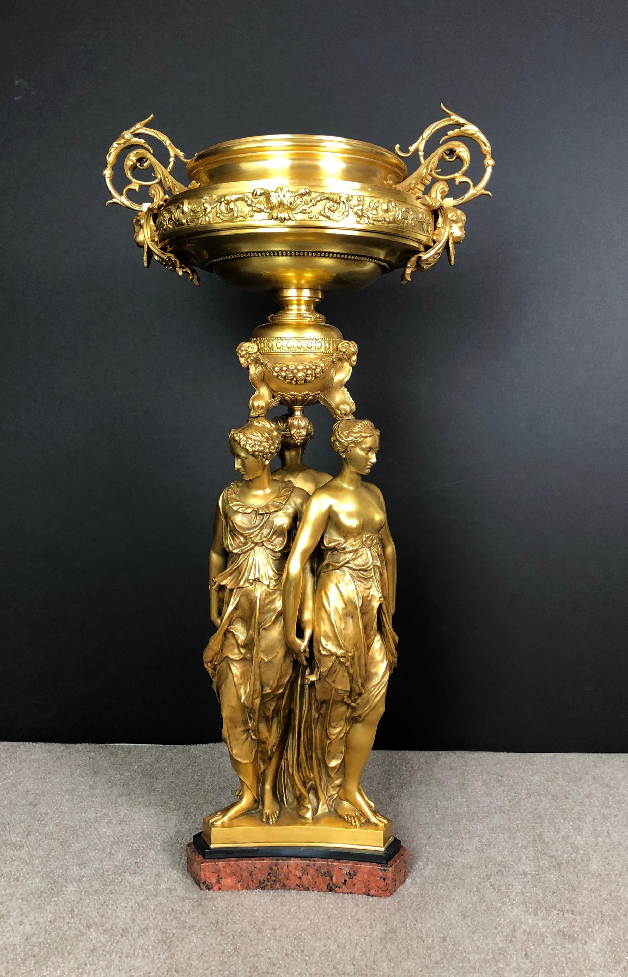 19th Century Signed Doré bronze Belle Époque Barbedienne centerpiece of large scale, in the Renaissance style, on a red and black marble base. Three graces gilt bronze figural sculpture centerpiece. 19th century antique, after a model by Germain