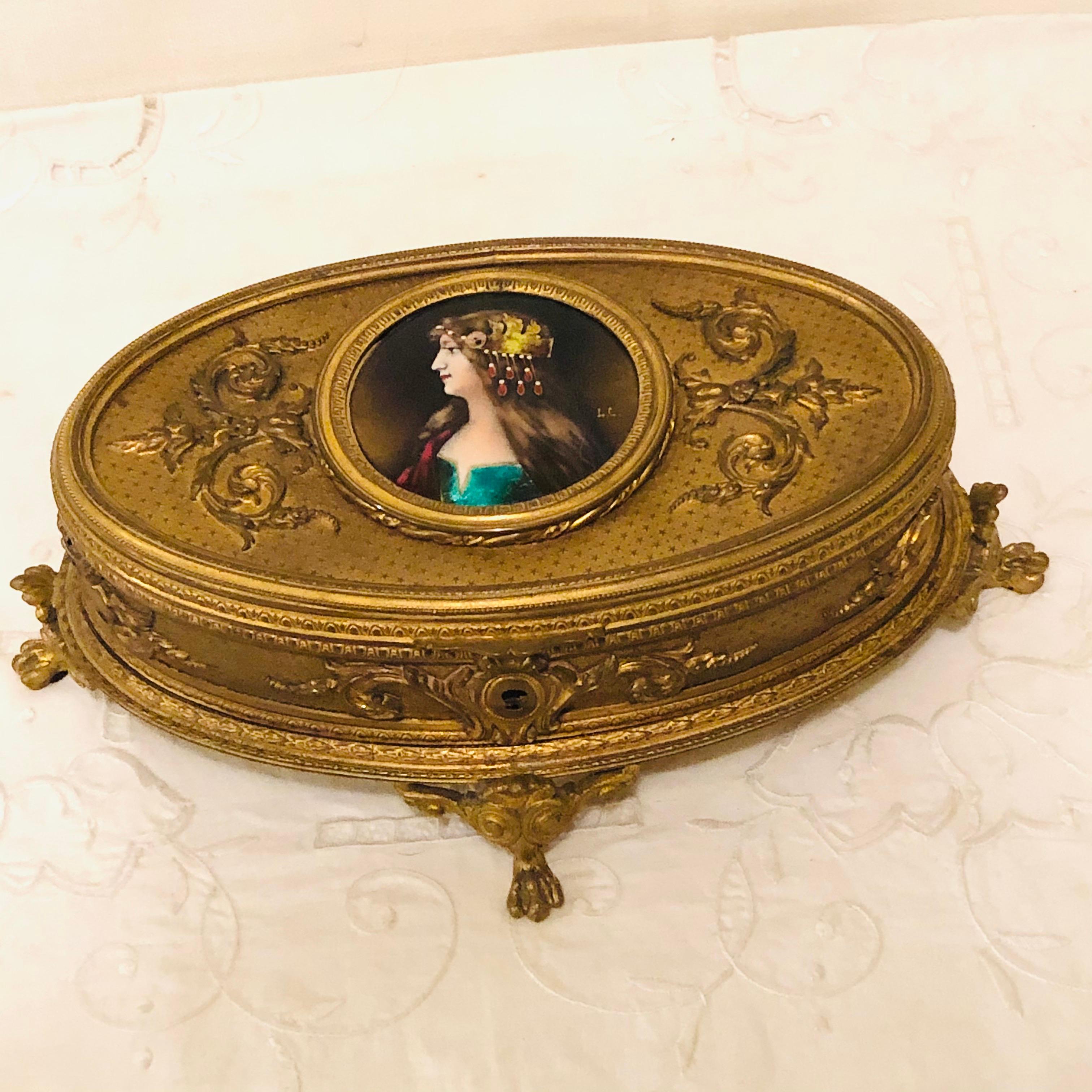 Late 19th Century Gilt Bronze Box with Enamel Portrait of Beautiful Lady on Four Raised Feet For Sale