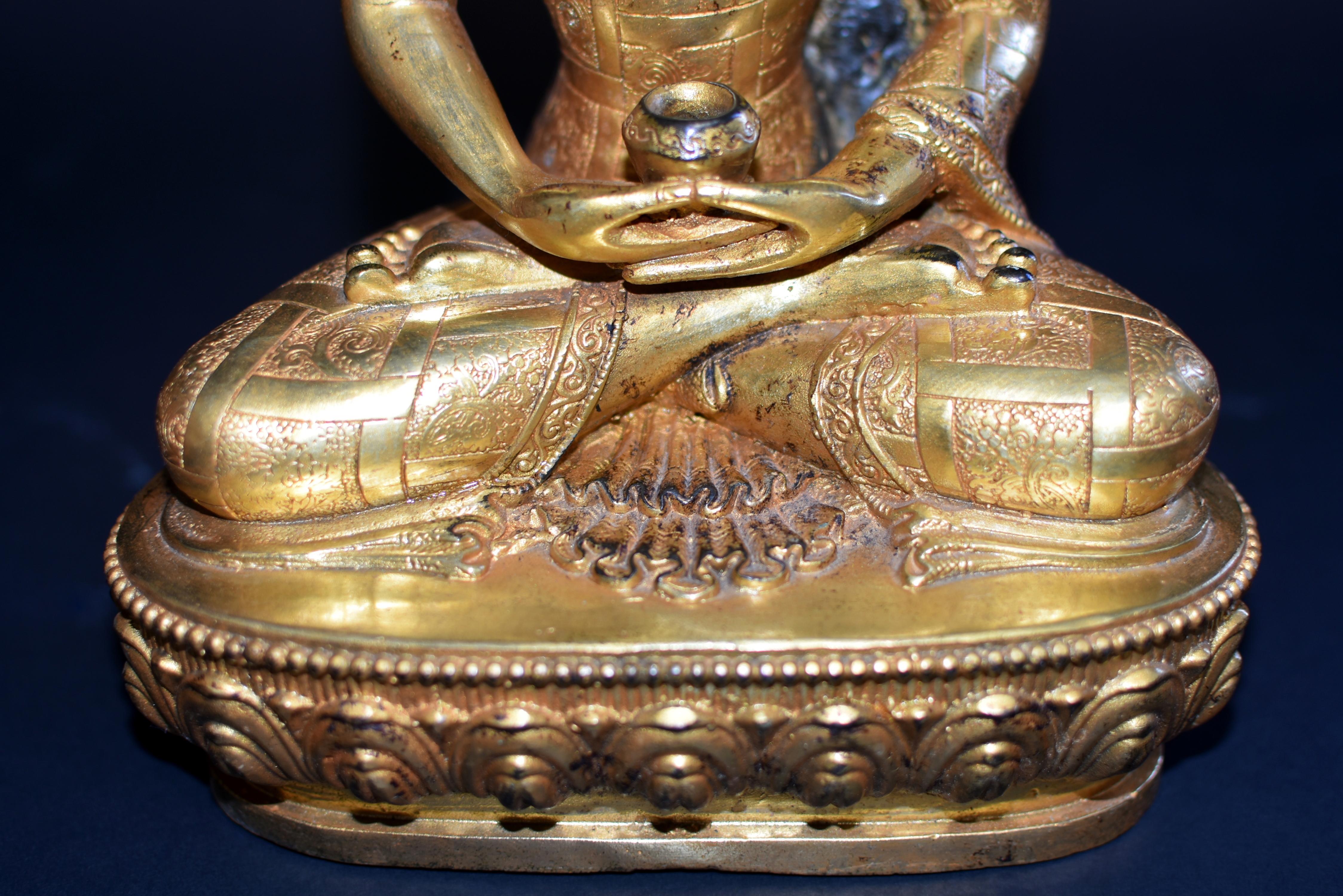 Gilt Bronze Buddha in Patchwork Robe For Sale 9