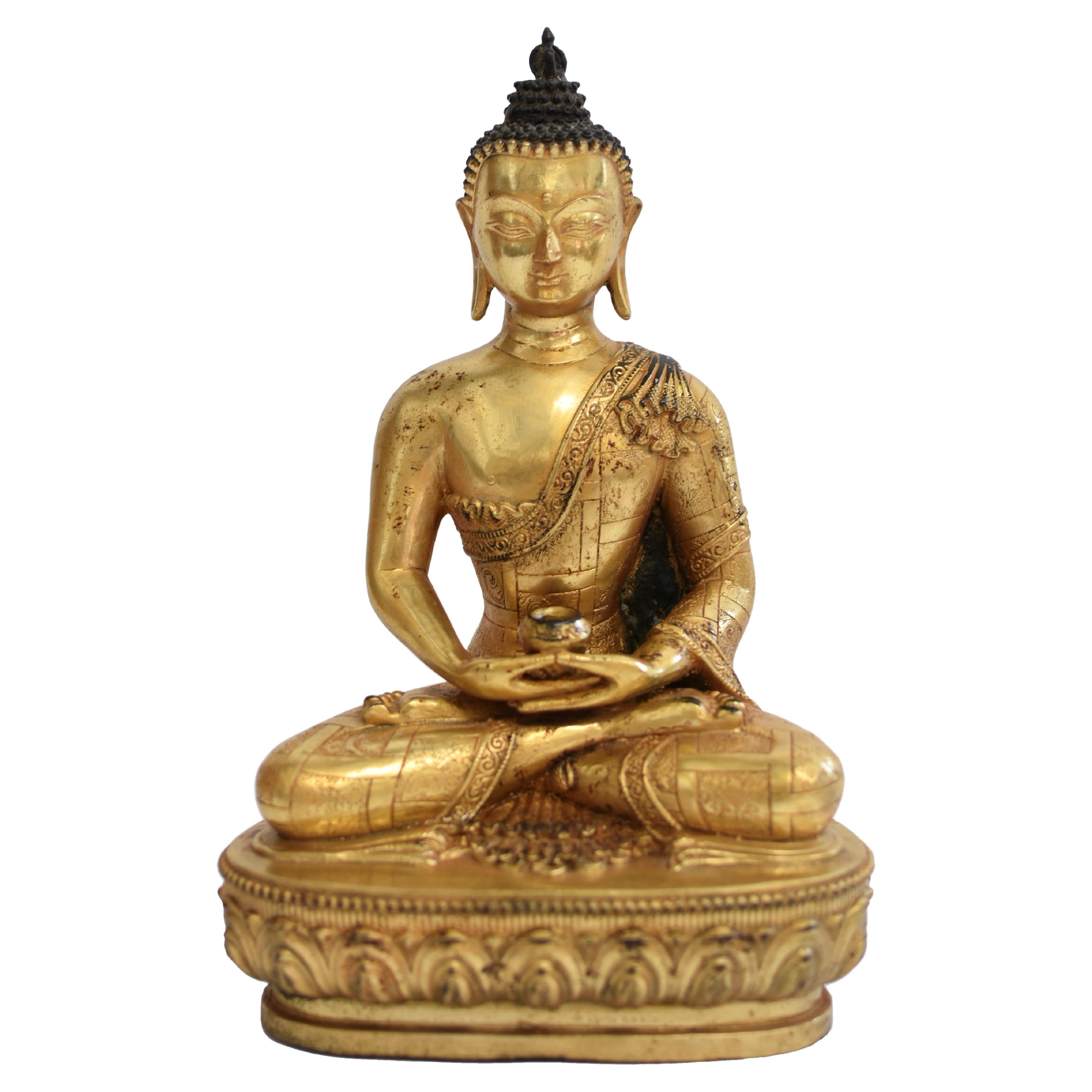 Buddha aus vergoldeter Bronze in Patchwork-Baumwolle