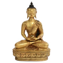 Buddha aus vergoldeter Bronze in Patchwork-Baumwolle