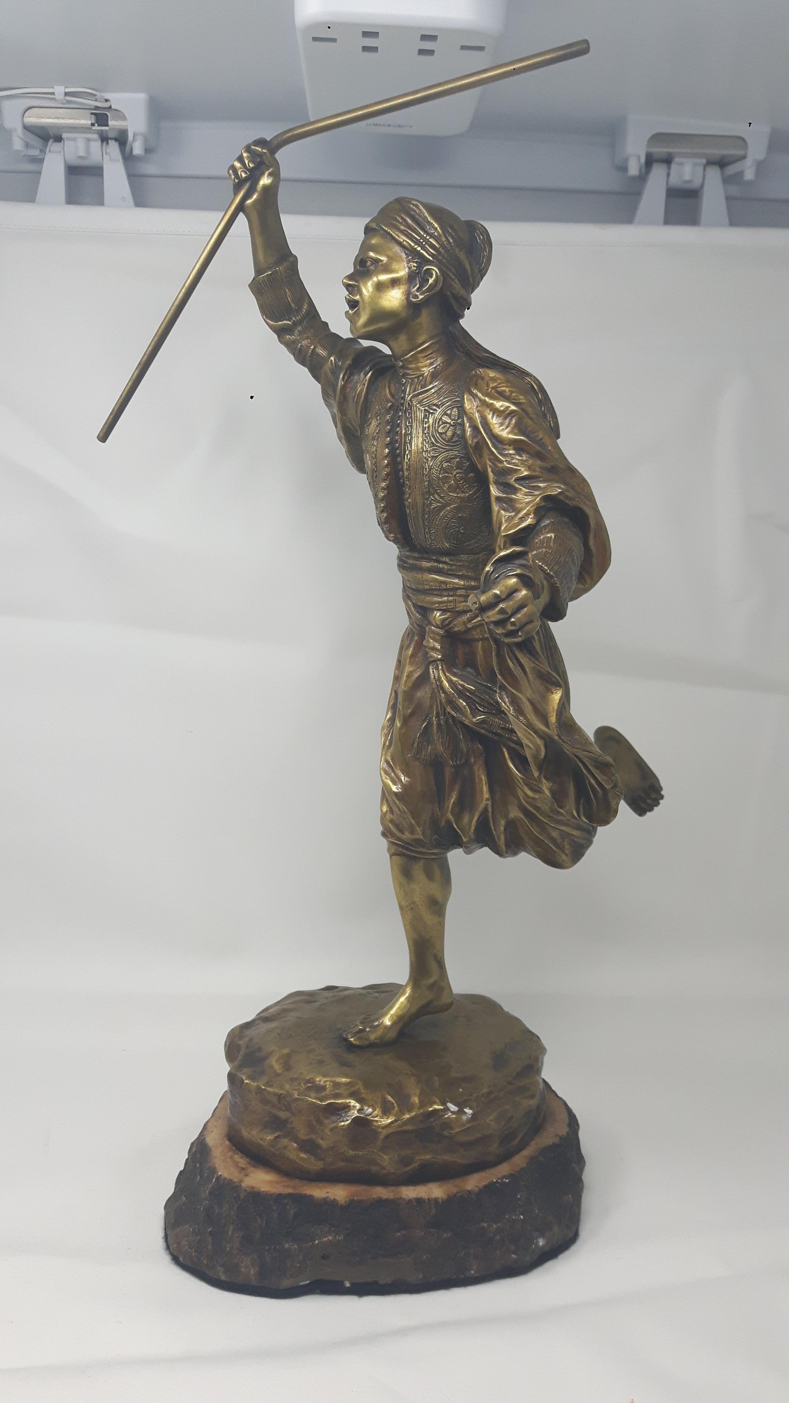 A gilt bronze by the Viennese sculptor T.Curts, depicting a running man in oriental dress.
Vienna.