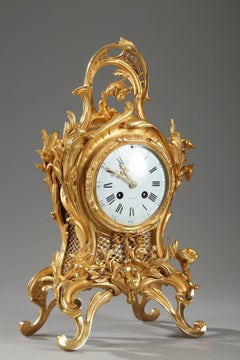 Pendule cartel en bronze doré de style Louis XV:: signée Eugène Bagues