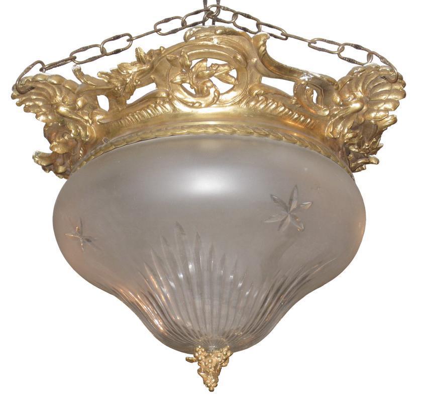 Gilt bronze pendant style chandelier in the Louis XVI fashion with frosted, engraved glass dome.