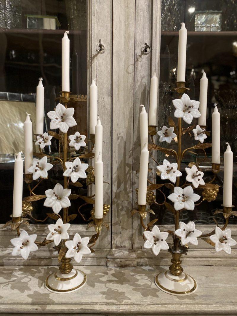 Stunning antique candelabra, beautifully decorated with 9 rare white opal glass lilies in various sizes, intermingled with brass vine leaves and grapes.Formed in gilded bronze and brass, with a rarely seen base, also in white opal glass.

This is a