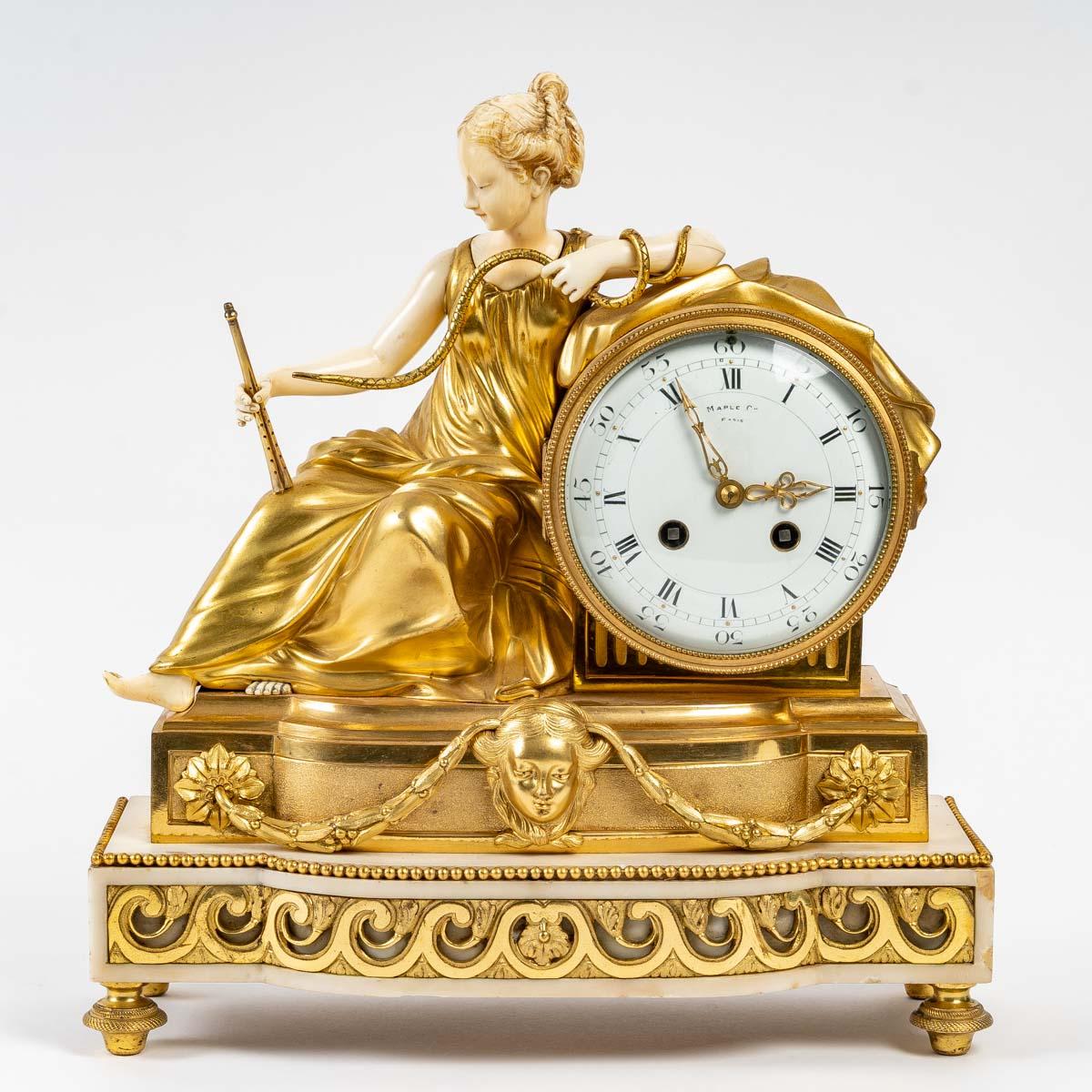 Gilt bronze clock, 19th century
Elegant gilt bronze and marble clock, Maple movement, Paris, Napoleon III period, 19th century.
Measures: H: 35 cm, W: 31 cm, D: 13 cm.
   