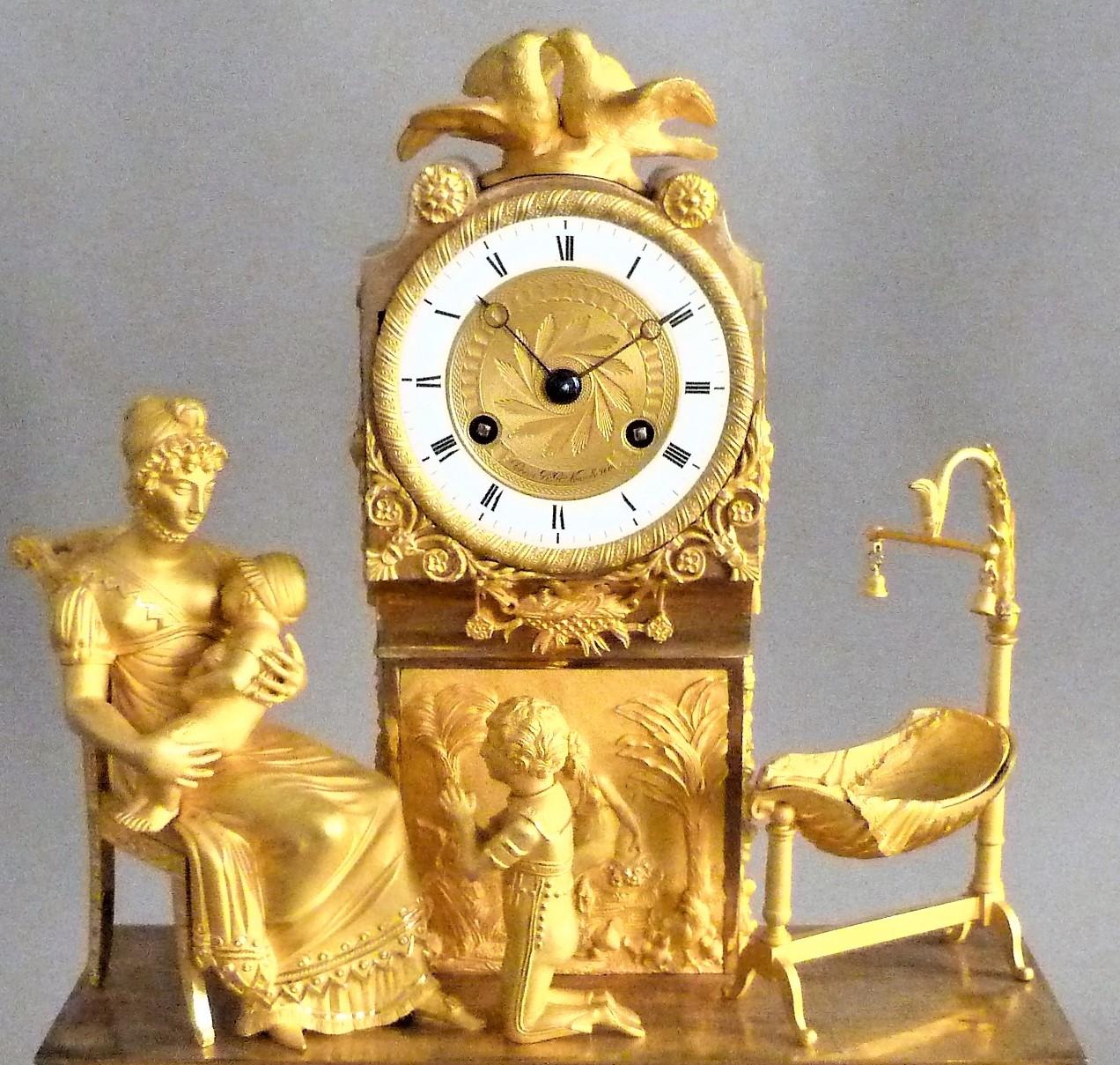 Beautiful and rare gilded bronze clock first third nineteenth time representing the birth of Henri d'Artois, grandson of France, Duke of Bordeaux, he is prince of the royal family of France. Partly enameled dial signed 