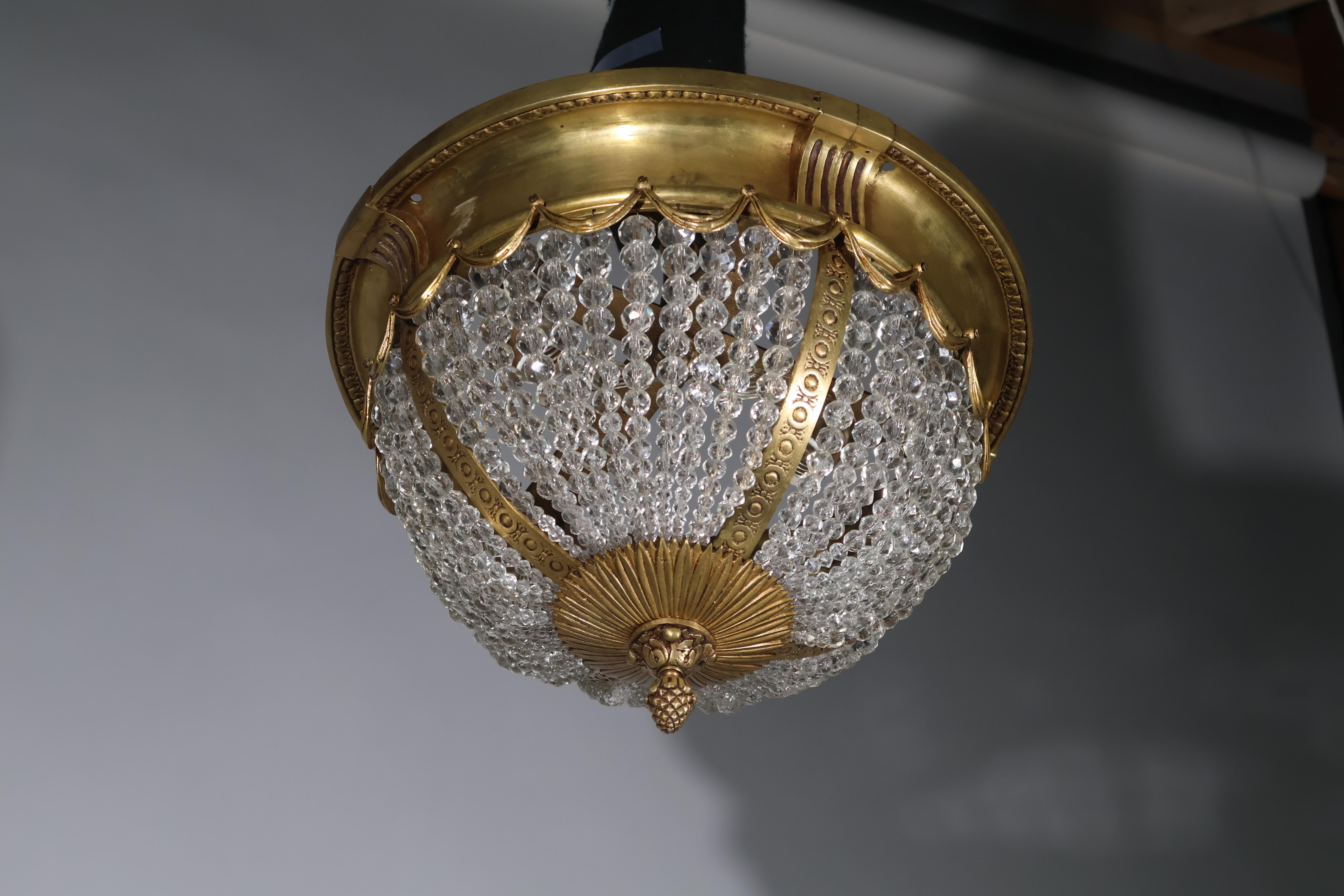 Bronzo Ciondolo in bronzo dorato e cristallo in vendita