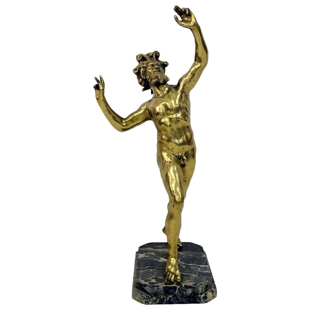 Figure en bronze doré du faune dansant de Pompeii