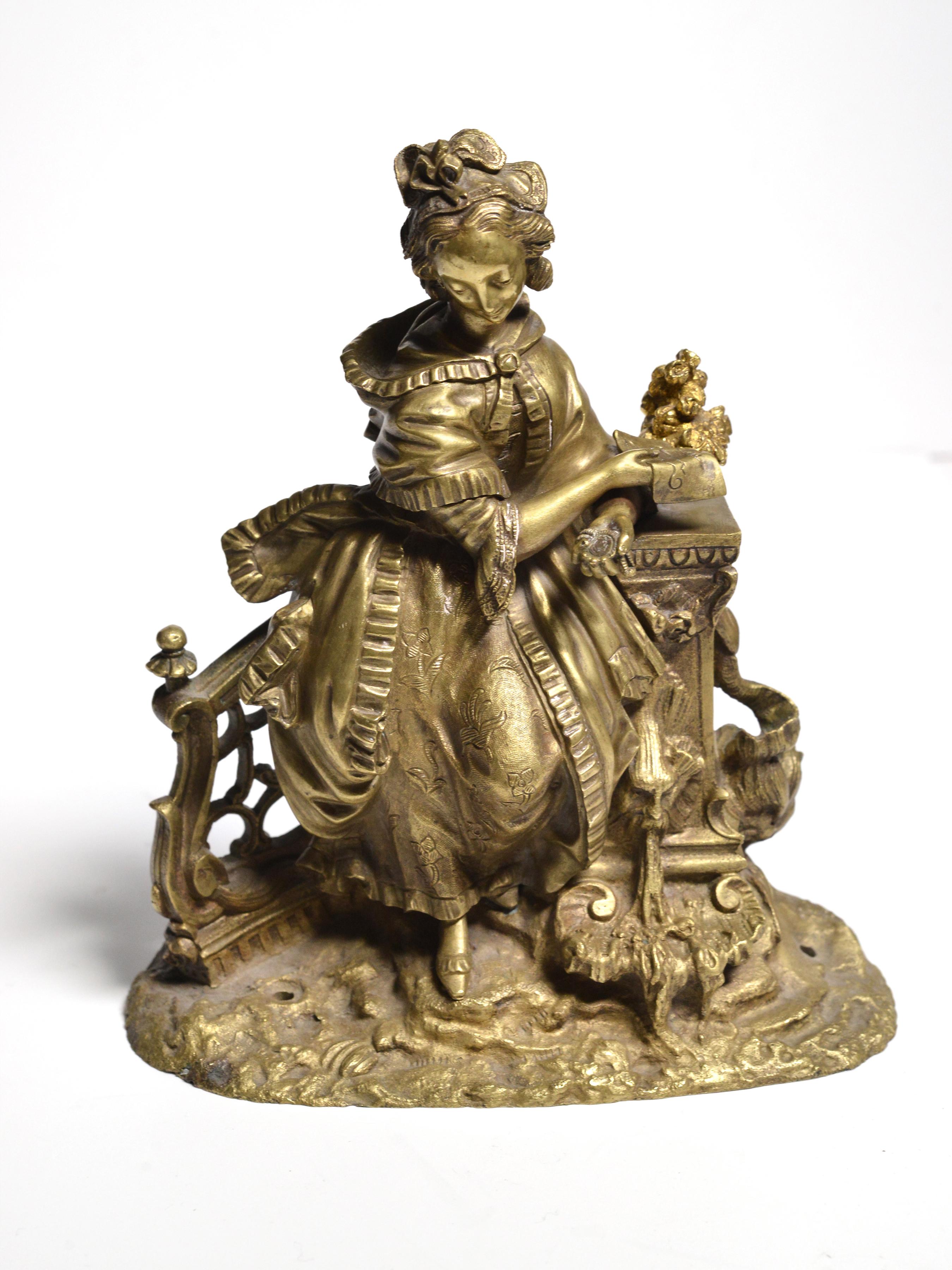 Step back in time with this stunning hand-chased cast bronze figurine, reminiscent of the beautiful Rococo era. Sculpture depicting a beautiful young lady in a garden by a fountain, holding a letter in one hand and a miniature portrait in the other.