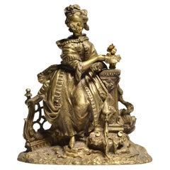Figurine en bronze doré Jeune femme avec lettre d'amour à la fontaine 19e siècle