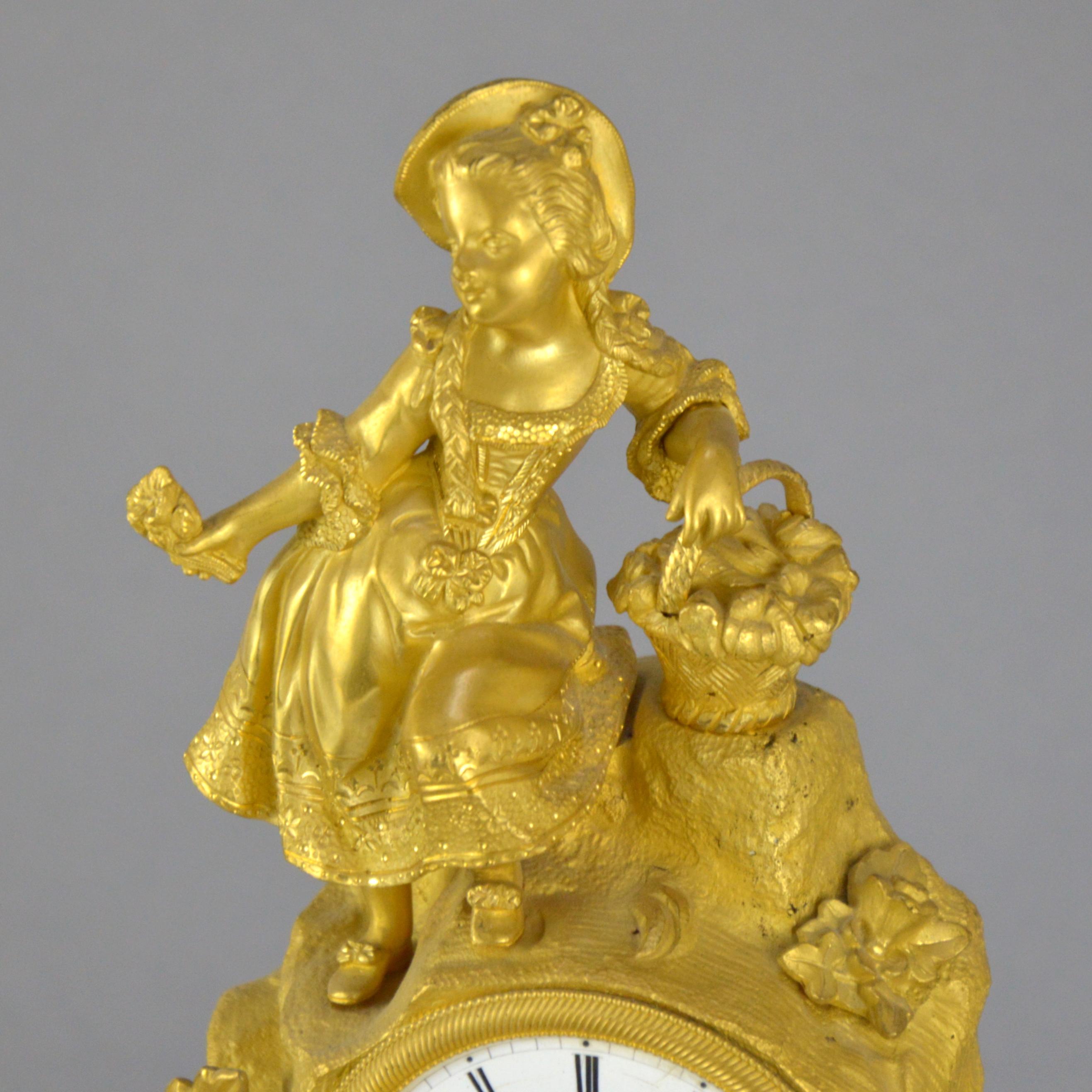 French Gilt Bronze 19th century Mazntel Clock Representing a Girl with a Flower Basket For Sale