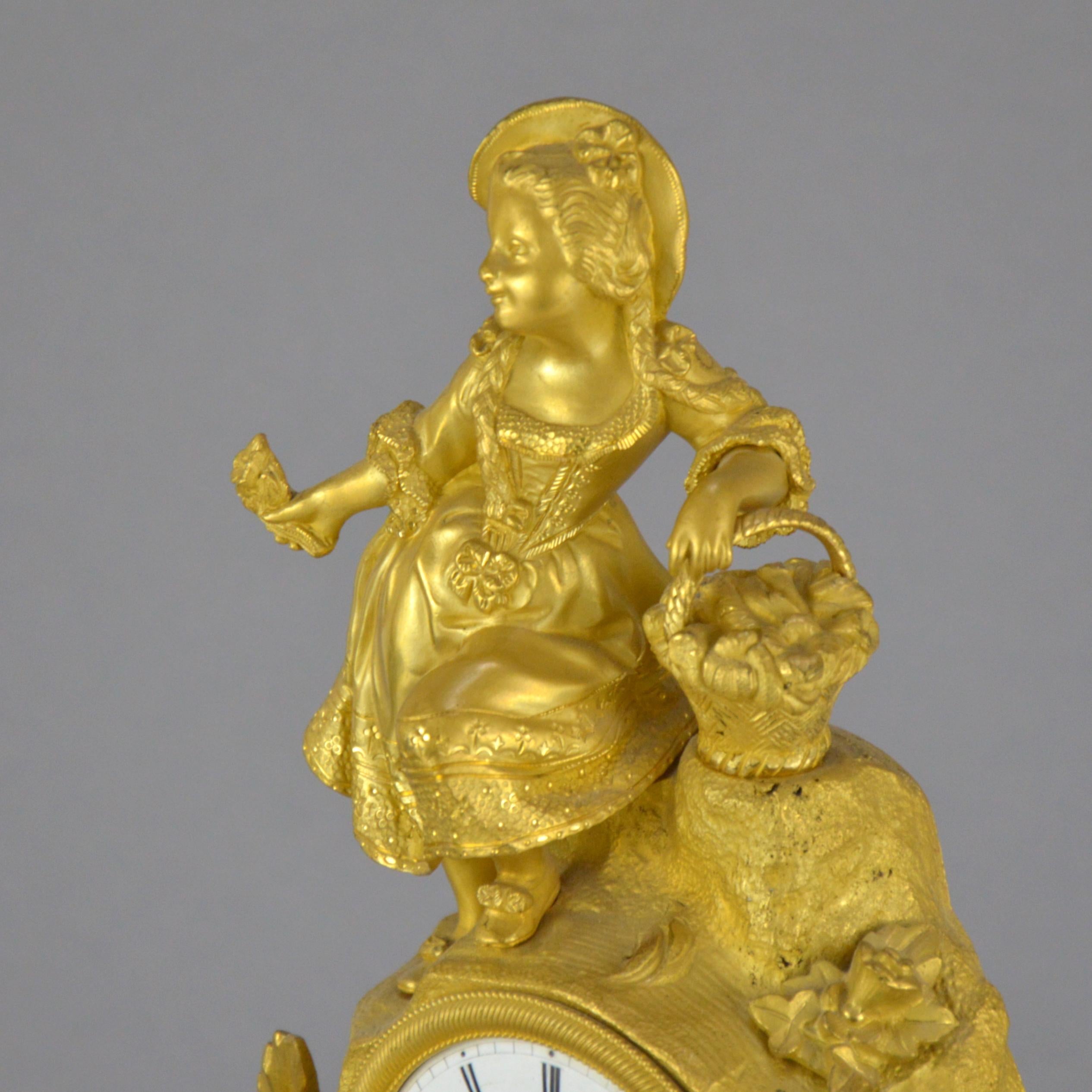 19th Century Gilt Bronze 19th century Mazntel Clock Representing a Girl with a Flower Basket For Sale