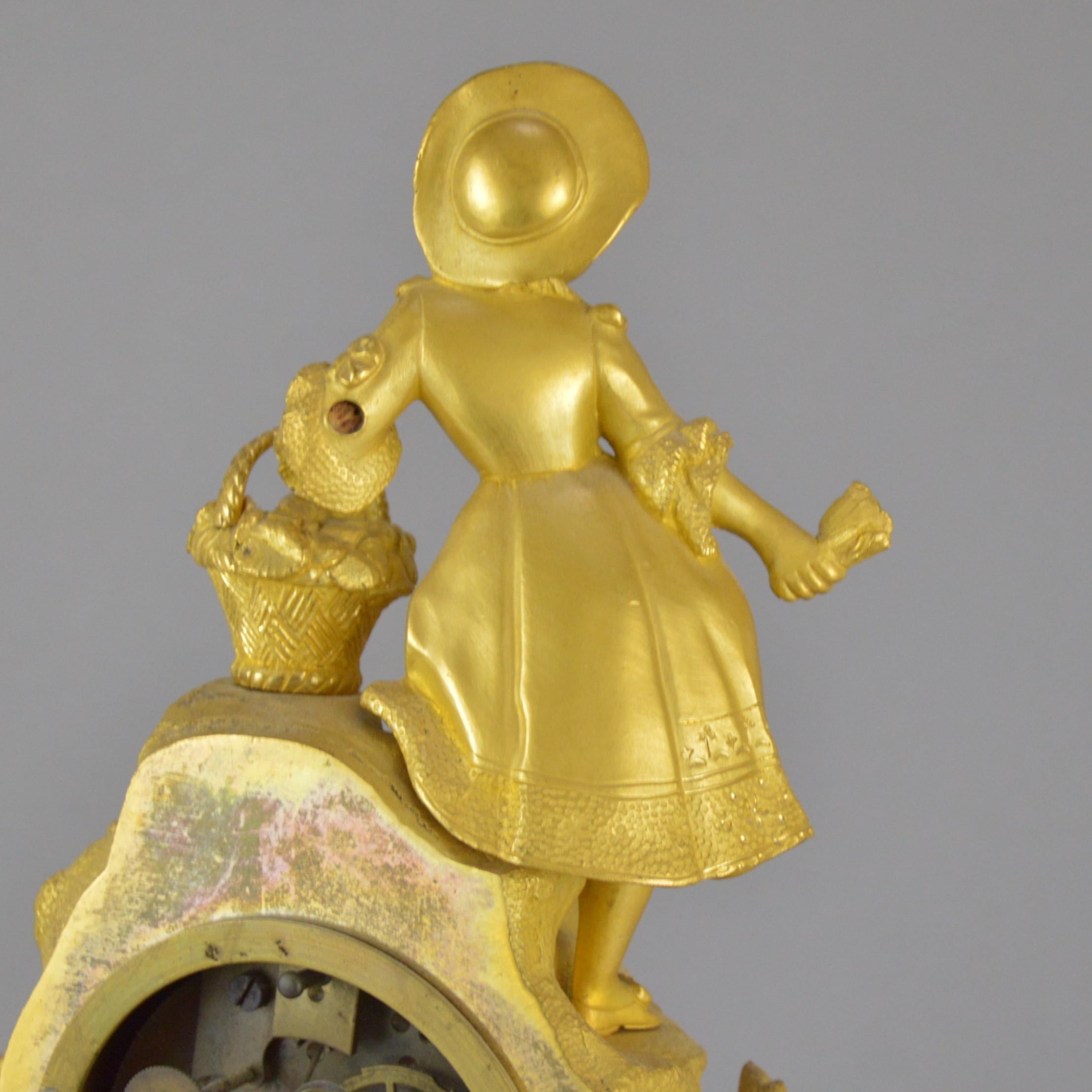 Gilt Bronze 19th century Mazntel Clock Representing a Girl with a Flower Basket For Sale 2
