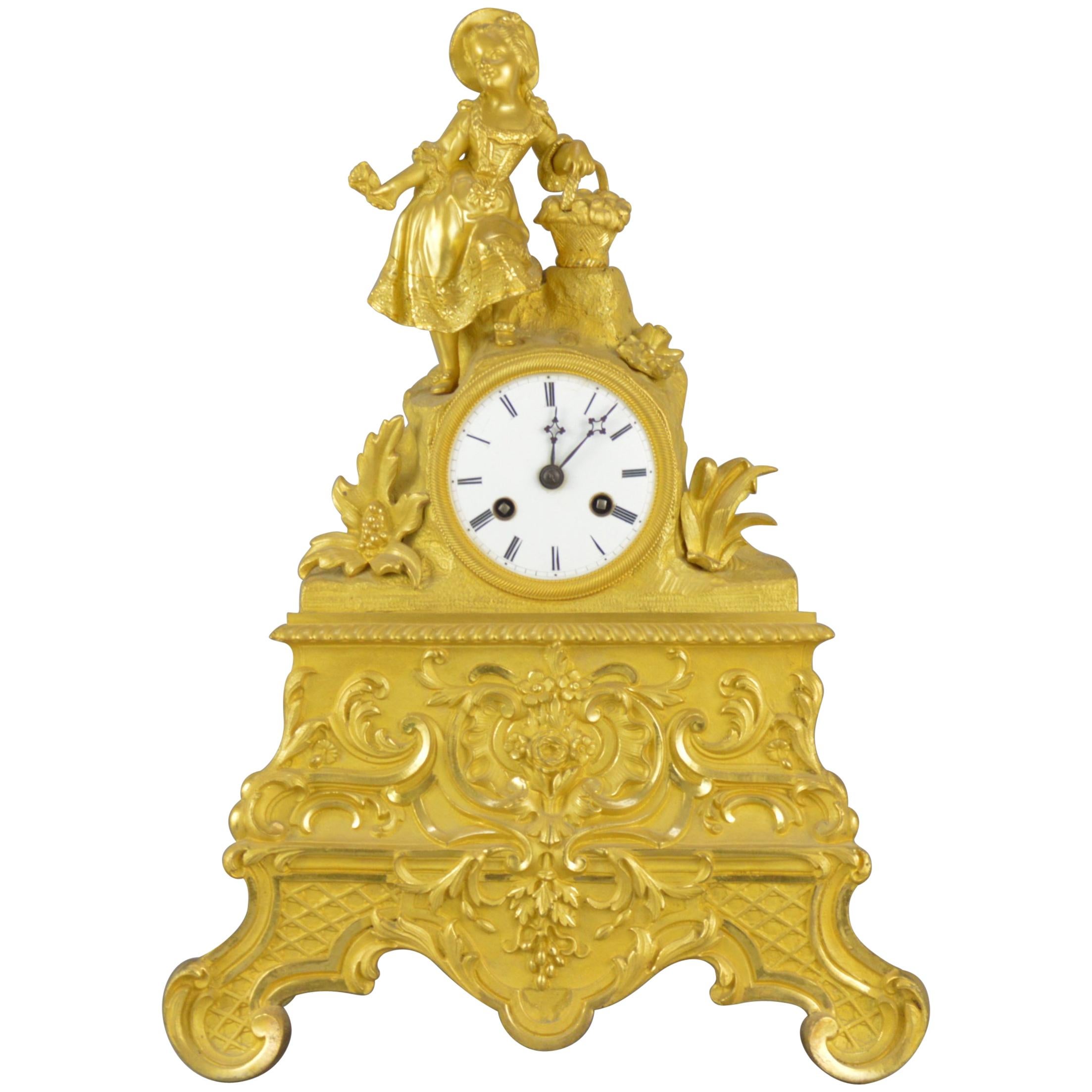 Gilt Bronze 19th century Mazntel Clock Representing a Girl with a Flower Basket For Sale