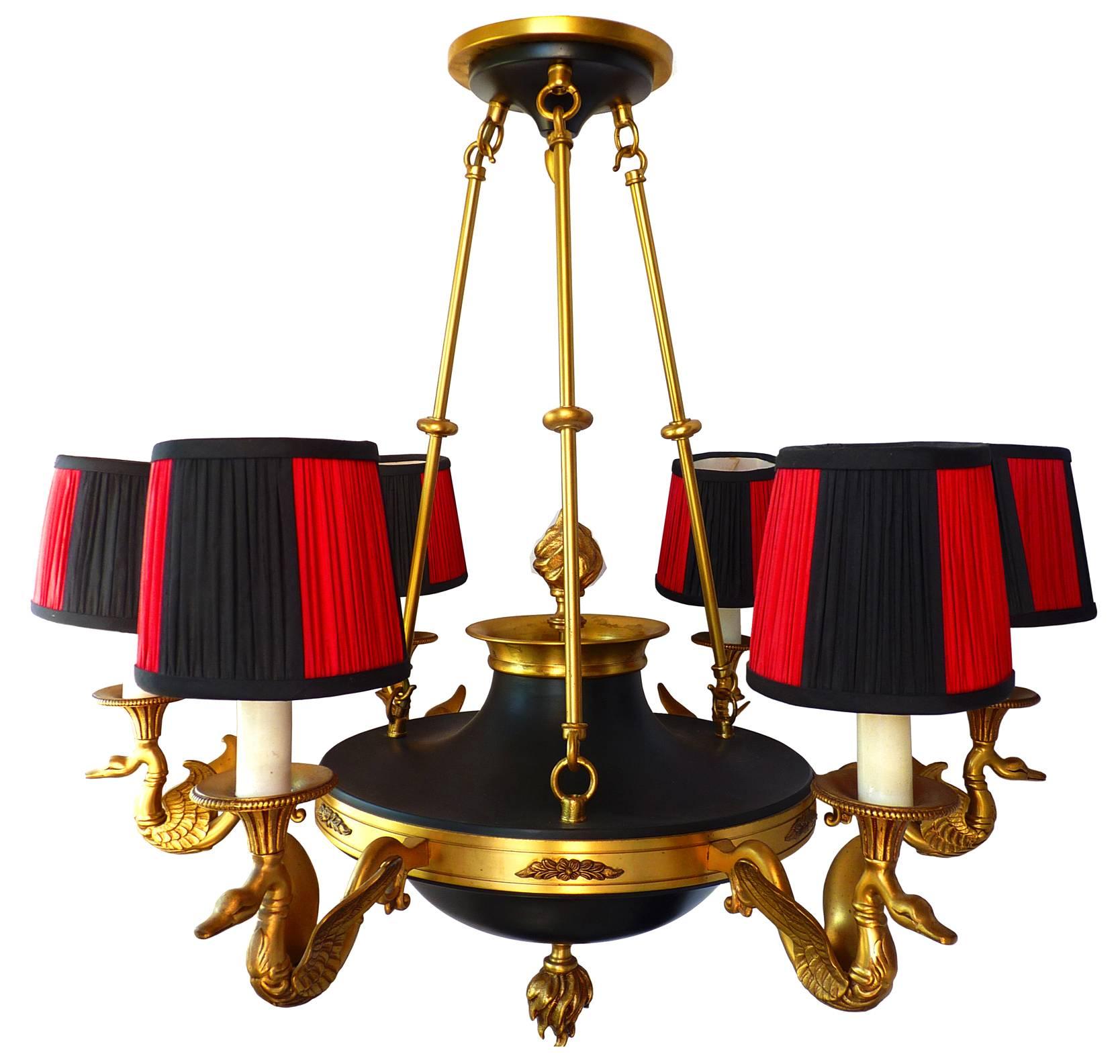 Splendid gilt bronze French Empire style chandelier with six swan’s light arms and unusual lampshades
Measures:
Diameter 77 cm
Height 77 cm + 83 chain = 160 cm
Weight 10 Kg/ 22 lb.
Six light bulb E 14/ good working condition.
Assembly required.