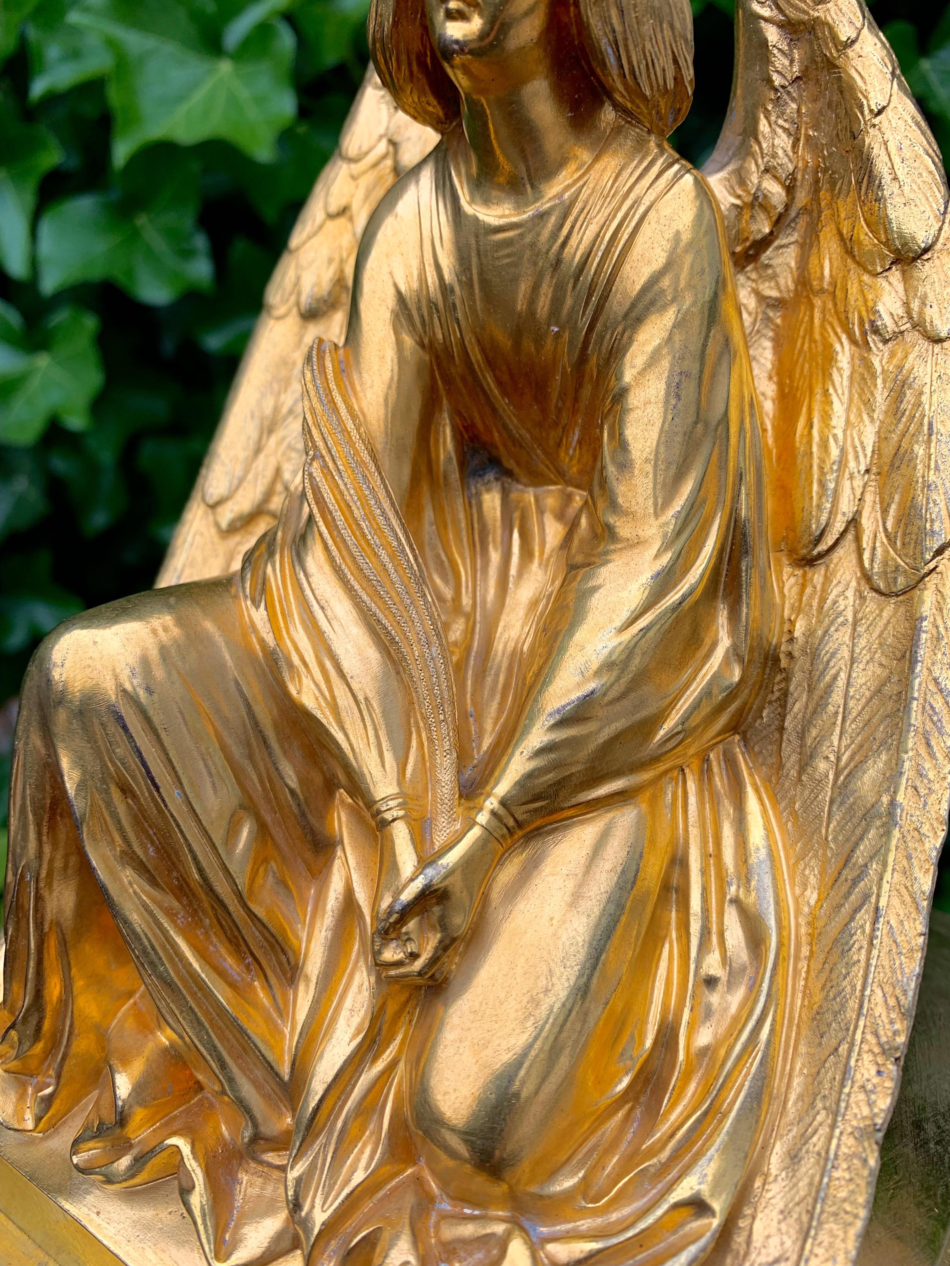 Brass Stunning Gilt Bronze Gothic Table Clock w Earth Angel Sculpture by Devaulx Paris For Sale