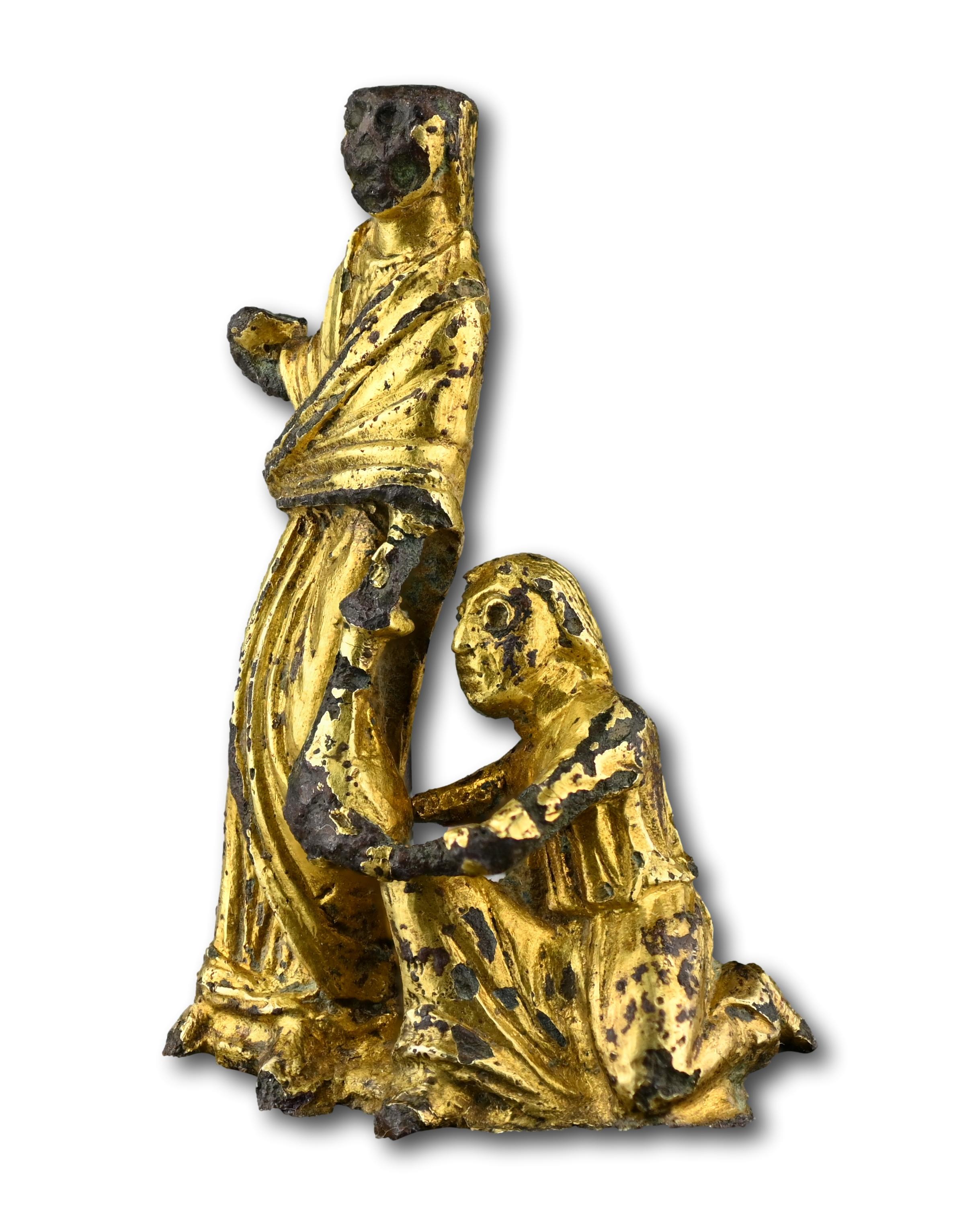 Groupe en bronze doré représentant un acte d'aumône. Angleterre, début du 12e siècle Unisexe en vente