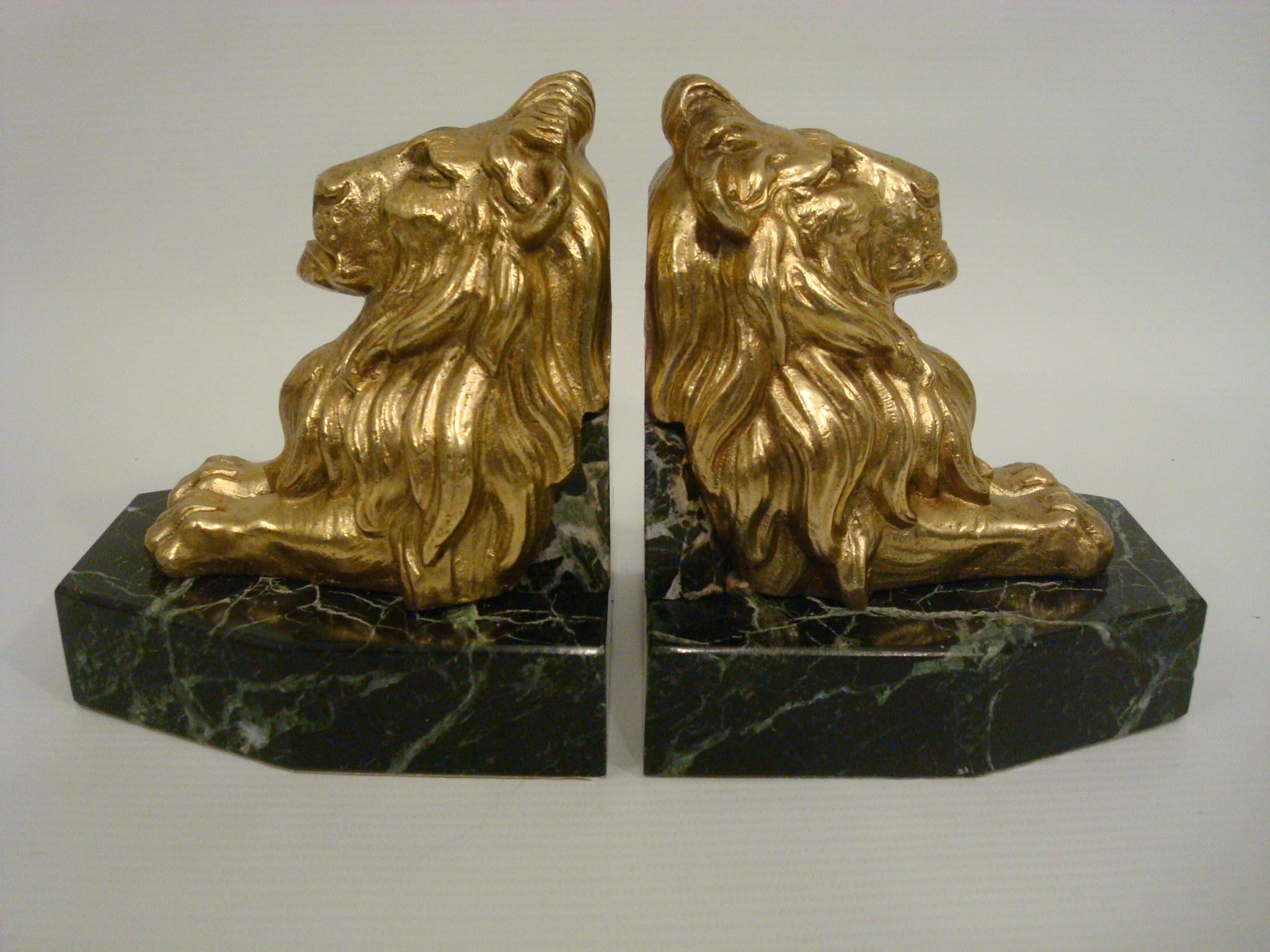 Gilt Bronze Guardian Lions Bookends. Signed H. Payen, France 1920´s.
Fantastic Pair of Lion Bronze sculptures, mounted over marble bases. 
Very Good confitions.