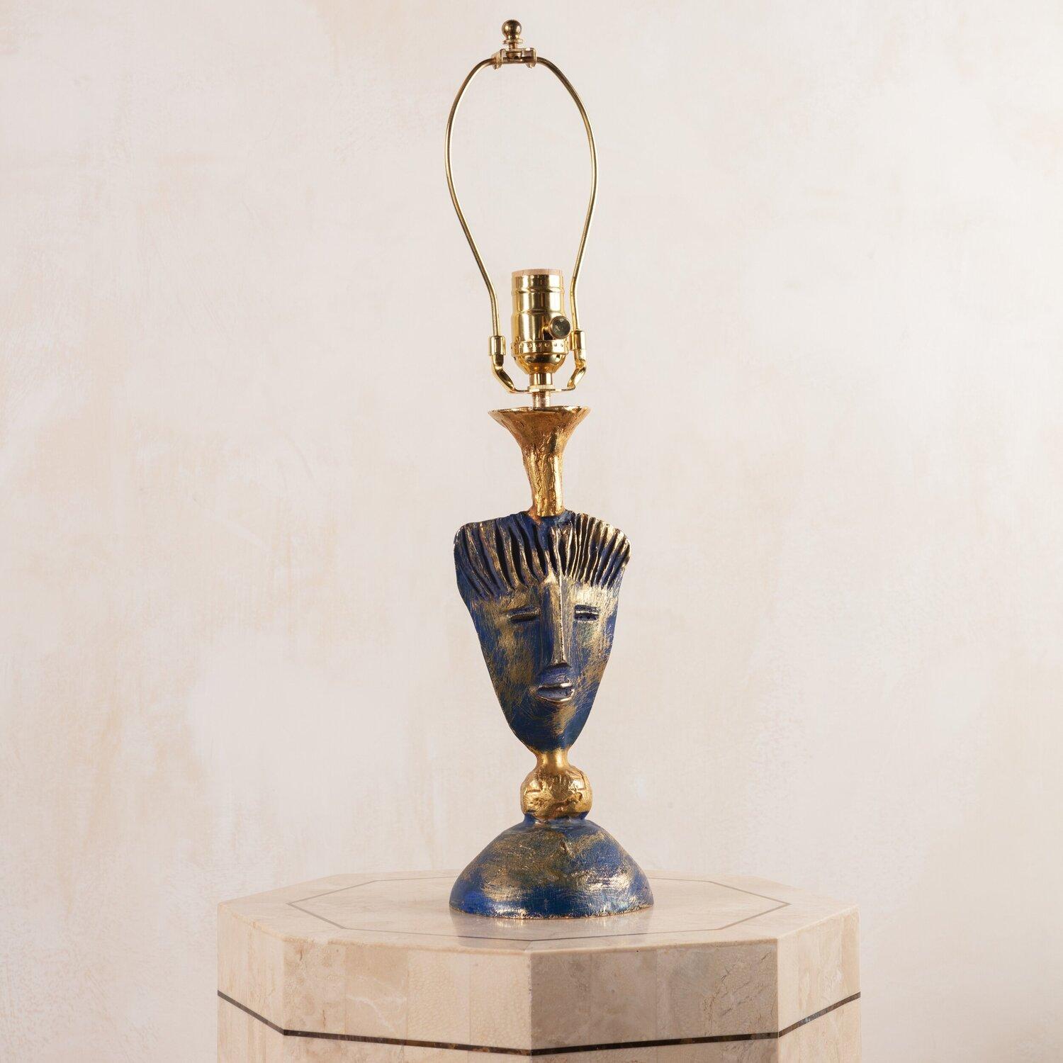 A gorgeous accent lamp designed by Pierre Casenove (1943-) in France for Fondica. This lamp features one of Casenove’s most iconic designs and is crafted of gilt bronze with azure accents.