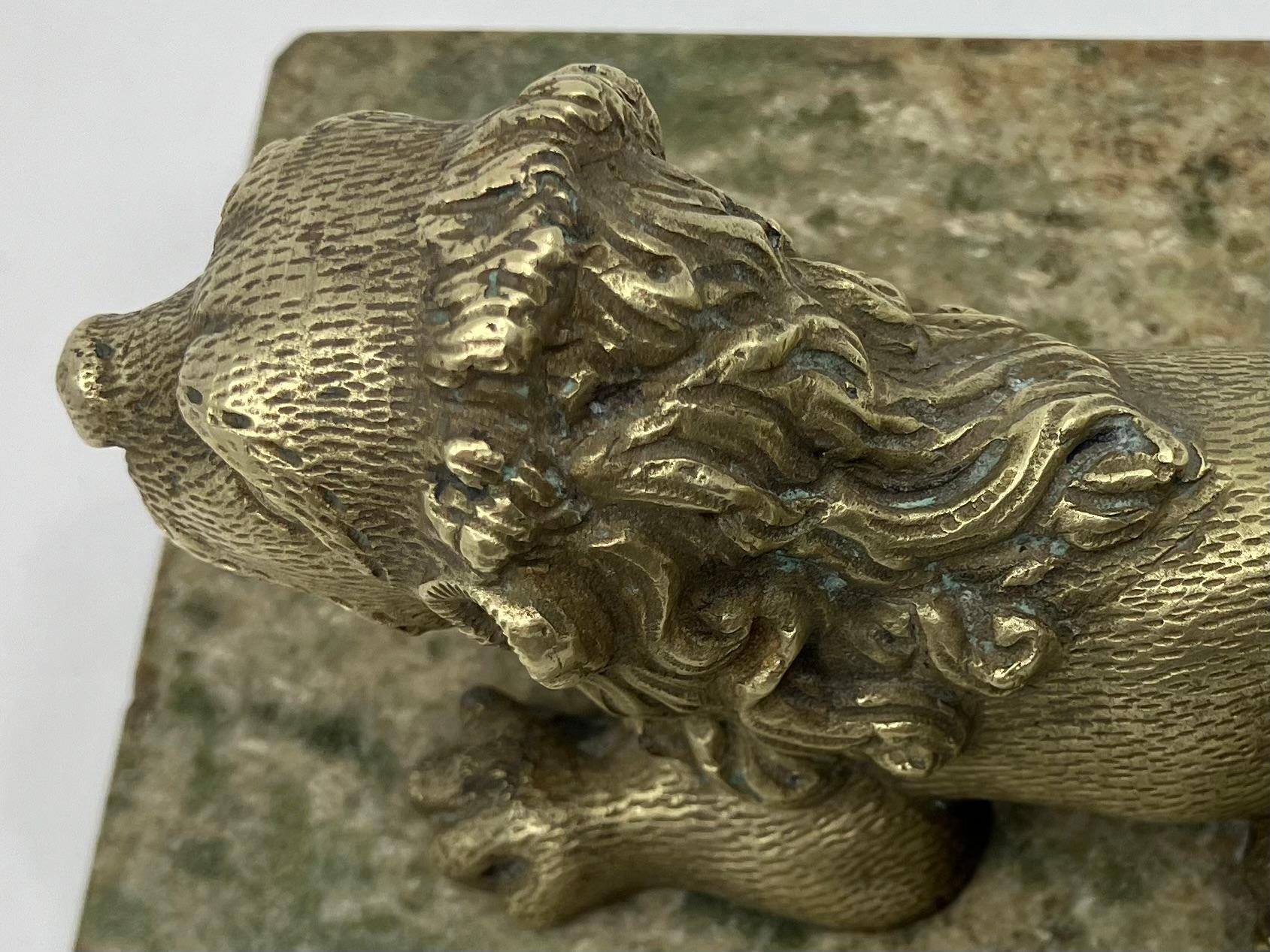 17th Century Gilt Bronze Lion on Marble Base For Sale
