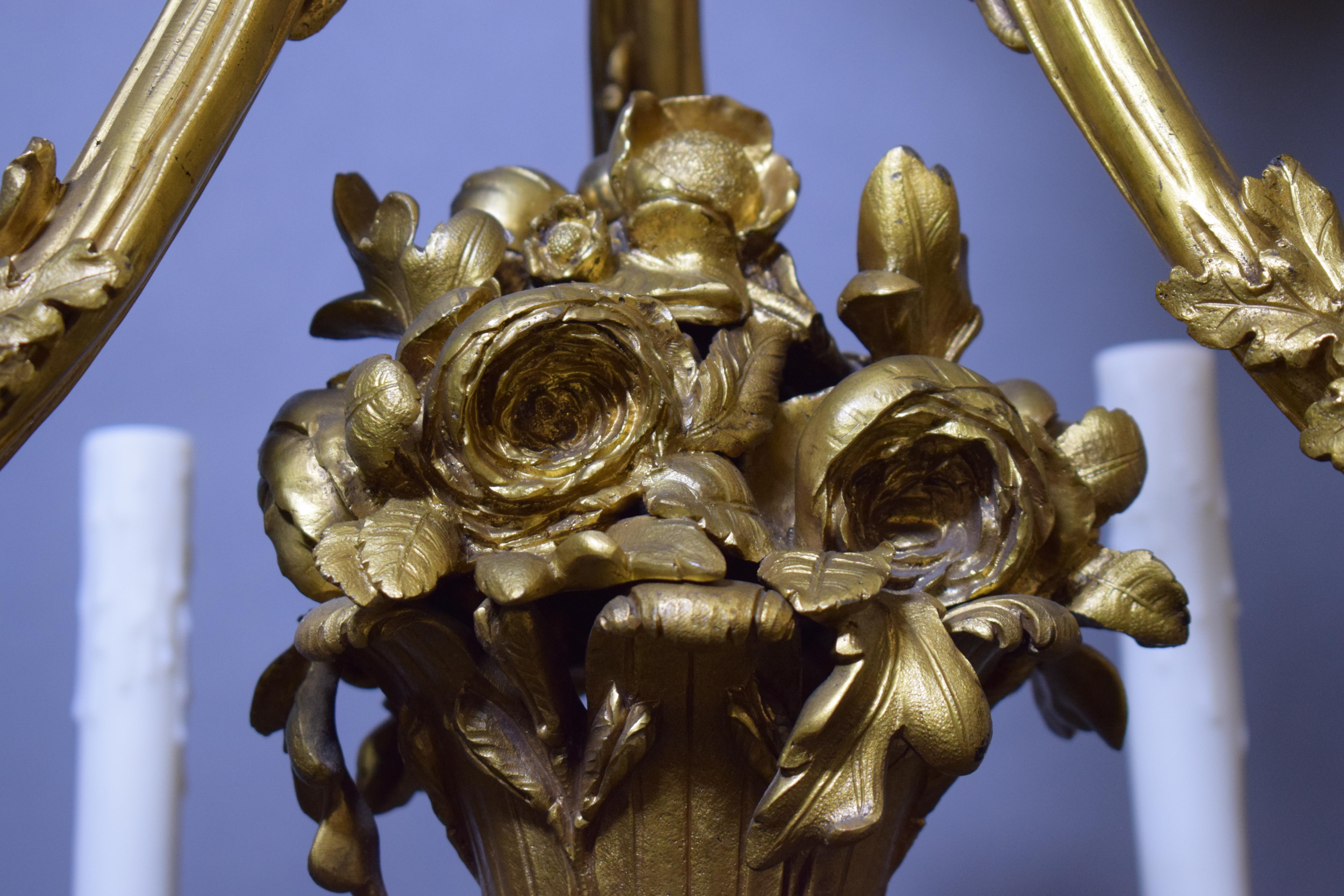 Gilt Bronze Louis XV style Chandelier. In Good Condition For Sale In Atlanta, GA