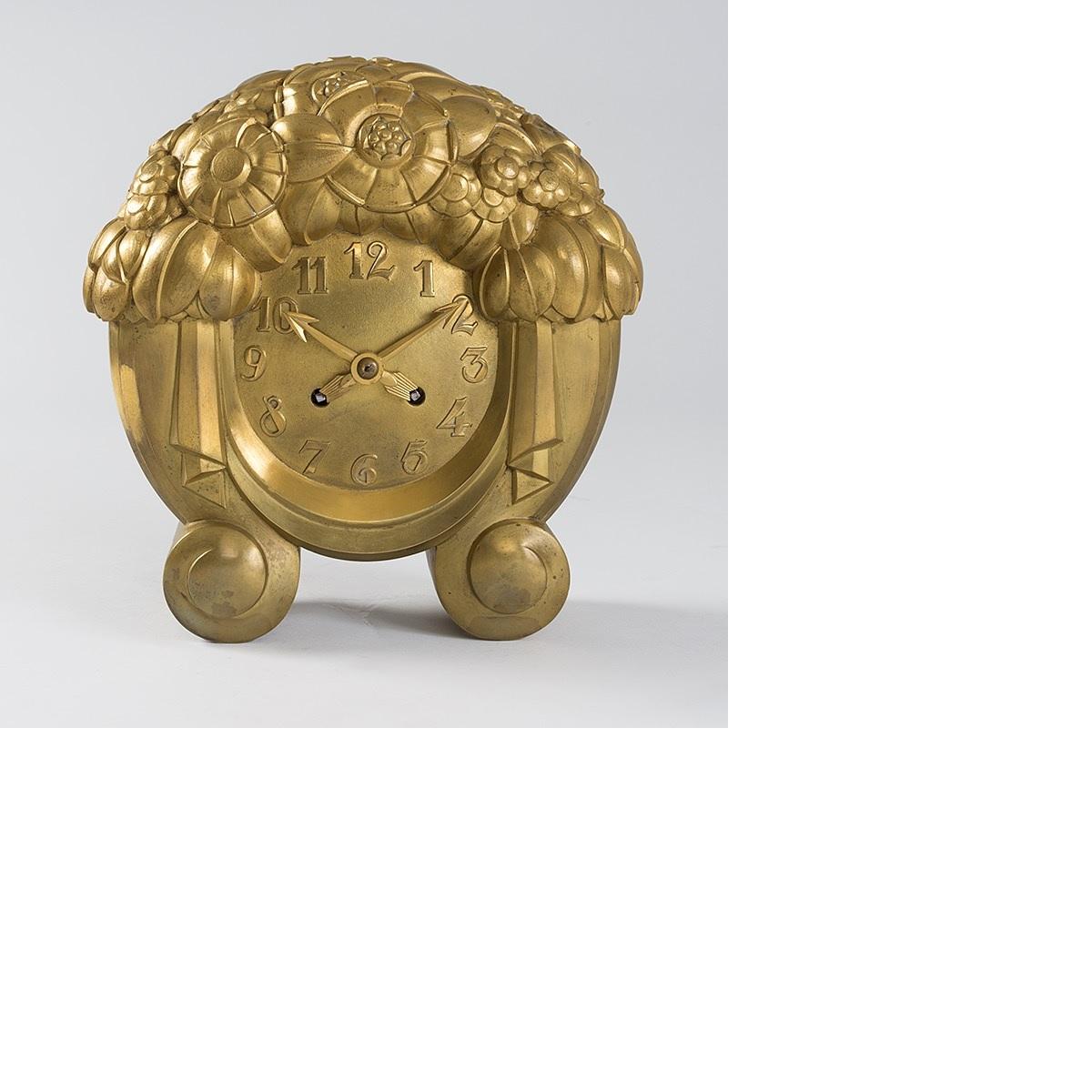 A French Süe et Mare gilt bronze mantel clock by André Mare. Model #5524, the twin train movement with lever platform escapement striking on a bell. Circa 1925.

In 1919 Louis Süe and André Mare founded the Compagnie des arts français (French Arts