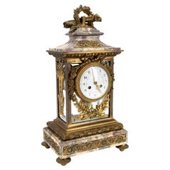 Horloge de manteau Fleur de Pecher en bronze doré et marbre