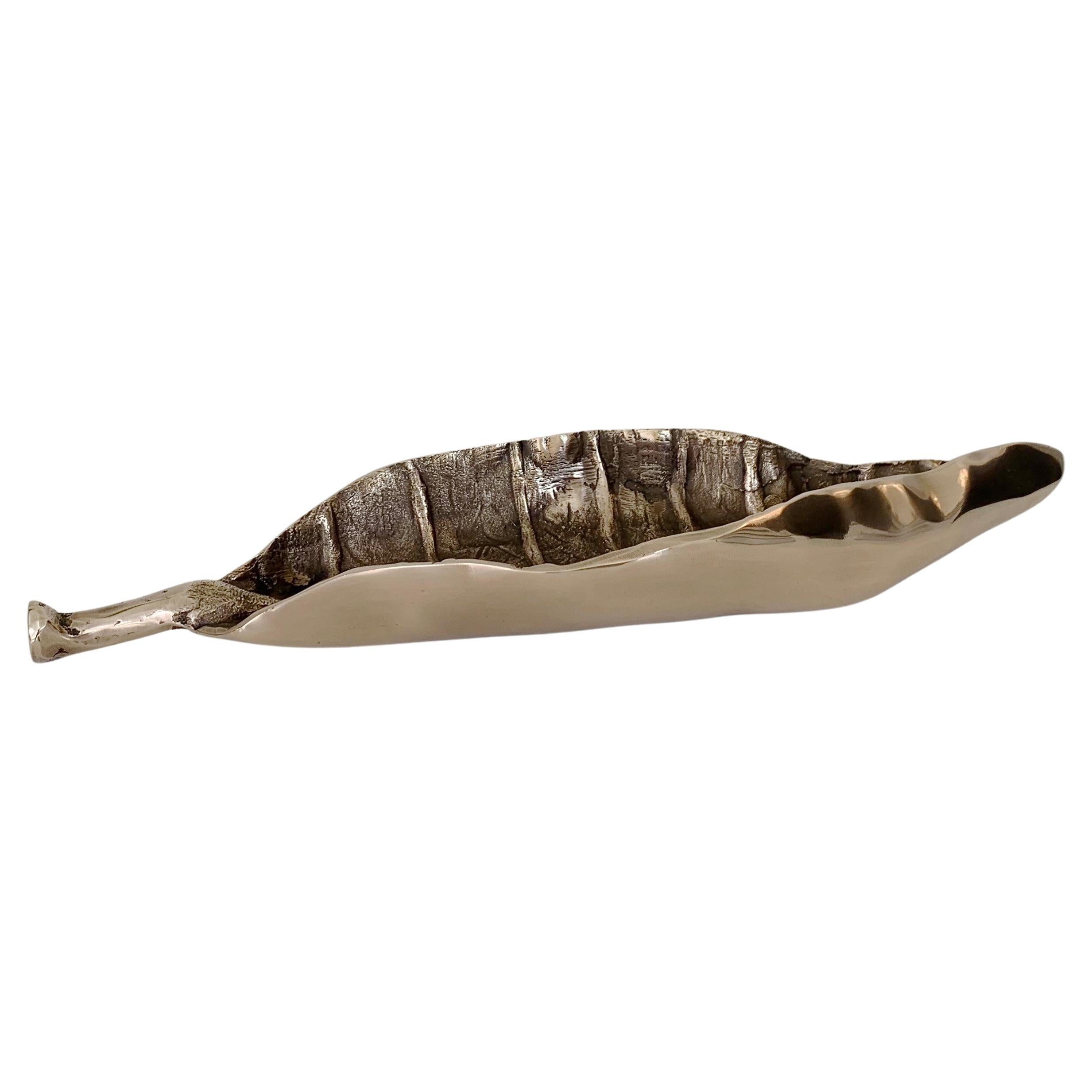 Decorative mid-century leaf-shaped vide-poche, circa 1970, France.
Polished gilt bronze.
Dimensions: 29 cm W, 9 cm D, 4 cm H.
Nice quality in good original condition.
All purchases are covered by our Buyer Protection Guarantee.
This item can be