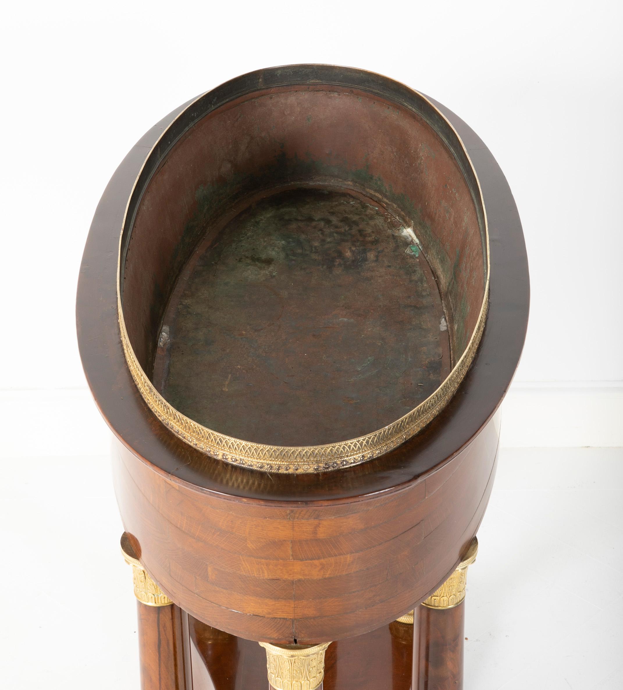 Gilt bronze mounted Empire style mahogany jardinière with metal liner, late 19th century.