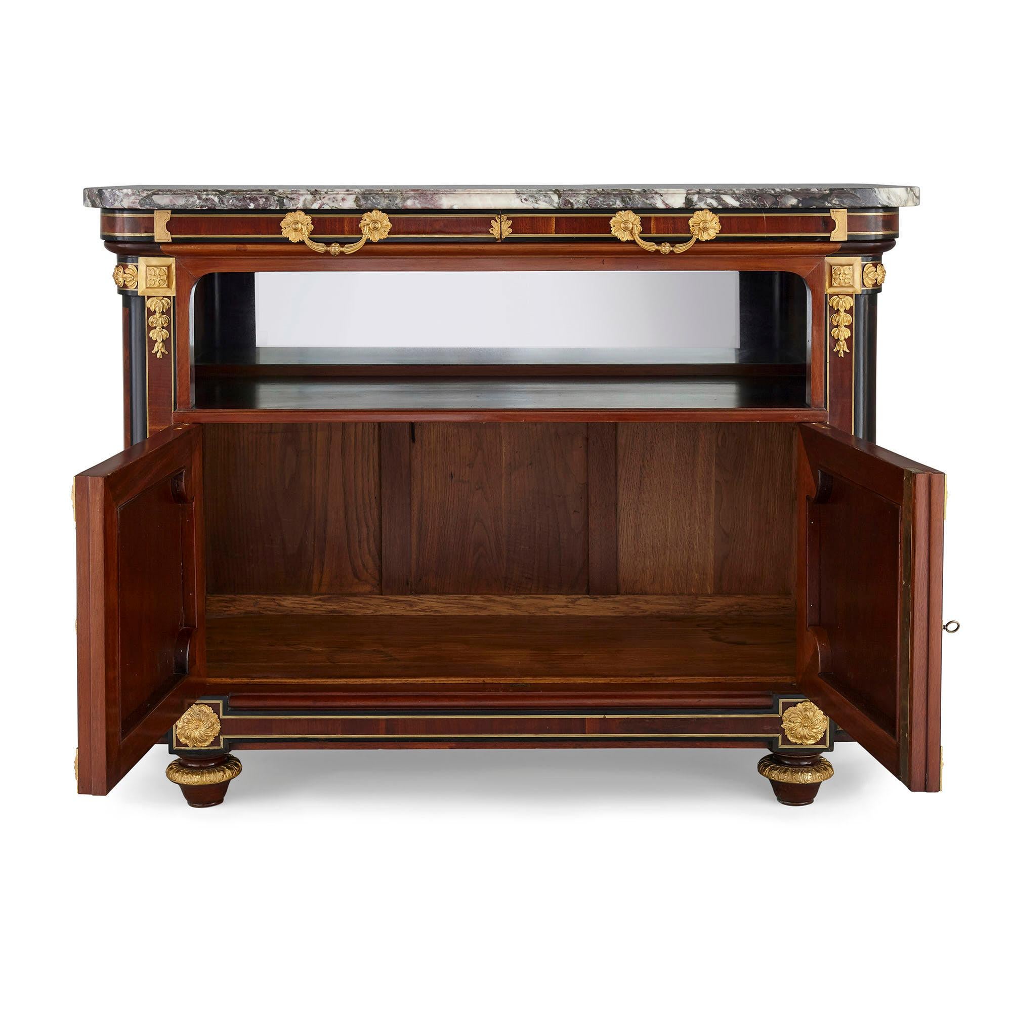 Gilt bronze mounted mahogany side cabinet by Mercier Frères
French, late 19th century
Dimensions: Height 98cm, width 132.5cm, depth 55cm

This superb buffet cabinet is by Mercier Frères, one of the leading manufacturers of furniture working in