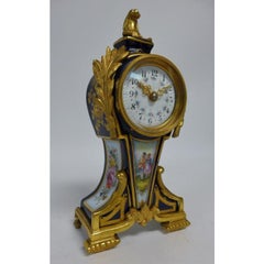 Orologio in porcellana montato in bronzo dorato