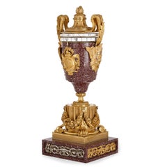Gilt Bronze Mounted Porphyry Revolving Dial Mantel Clock