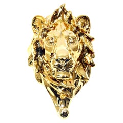 Porte-serviettes en bronze doré représentant la tête d'un lion, 20e siècle