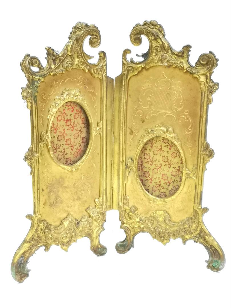 Gold-plated, foldable photo or picture frame- cast bronze from the mid-19th century.